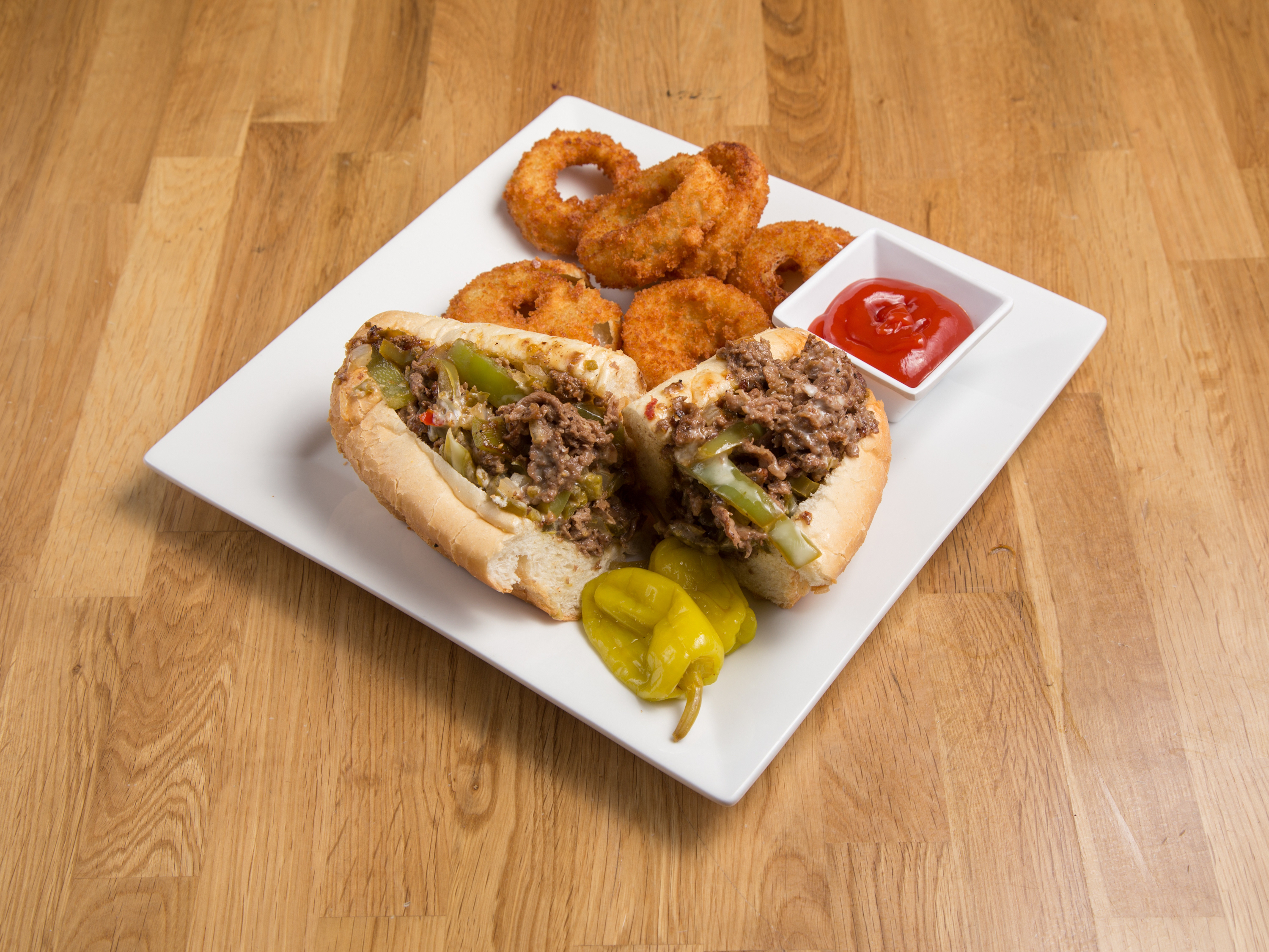 Order DELUXE PHILLY food online from Philly Sports Grill store, Phoenix on bringmethat.com