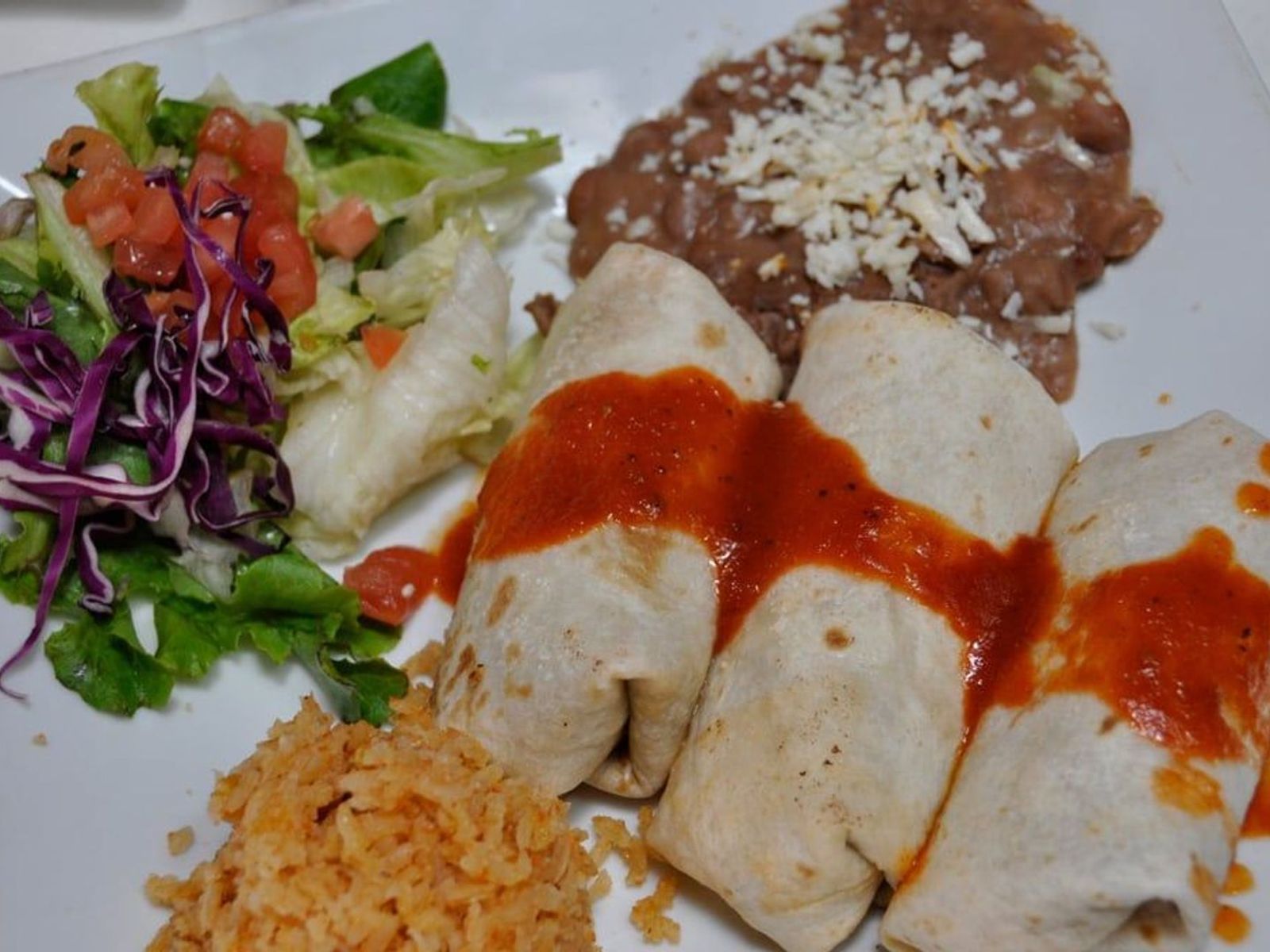 Order Chimichangas food online from El Nuevo Mexicano store, Chicago on bringmethat.com