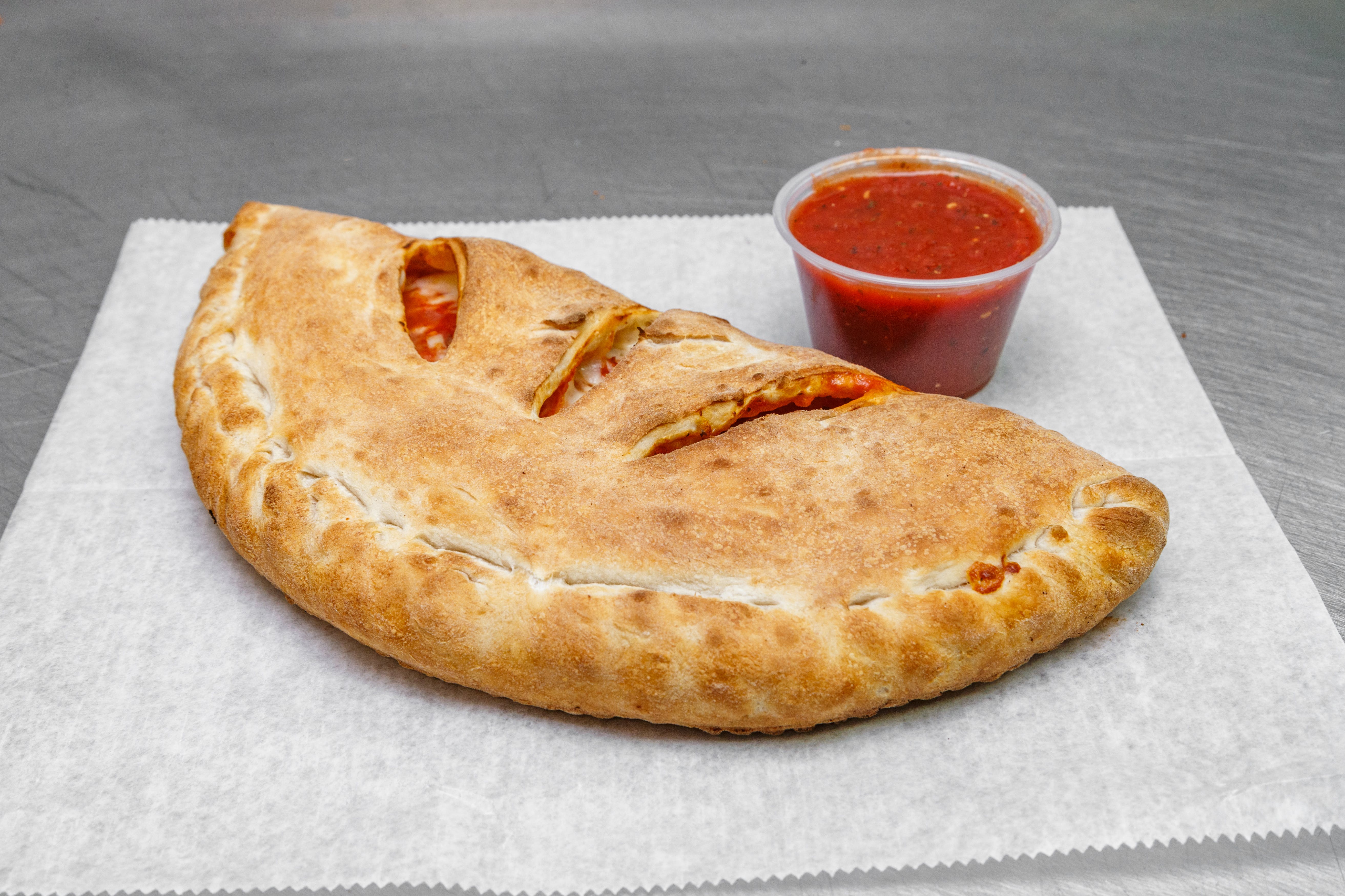 Order Create Your Own Calzone - Small food online from Pizza DeCasa store, Coraopolis on bringmethat.com