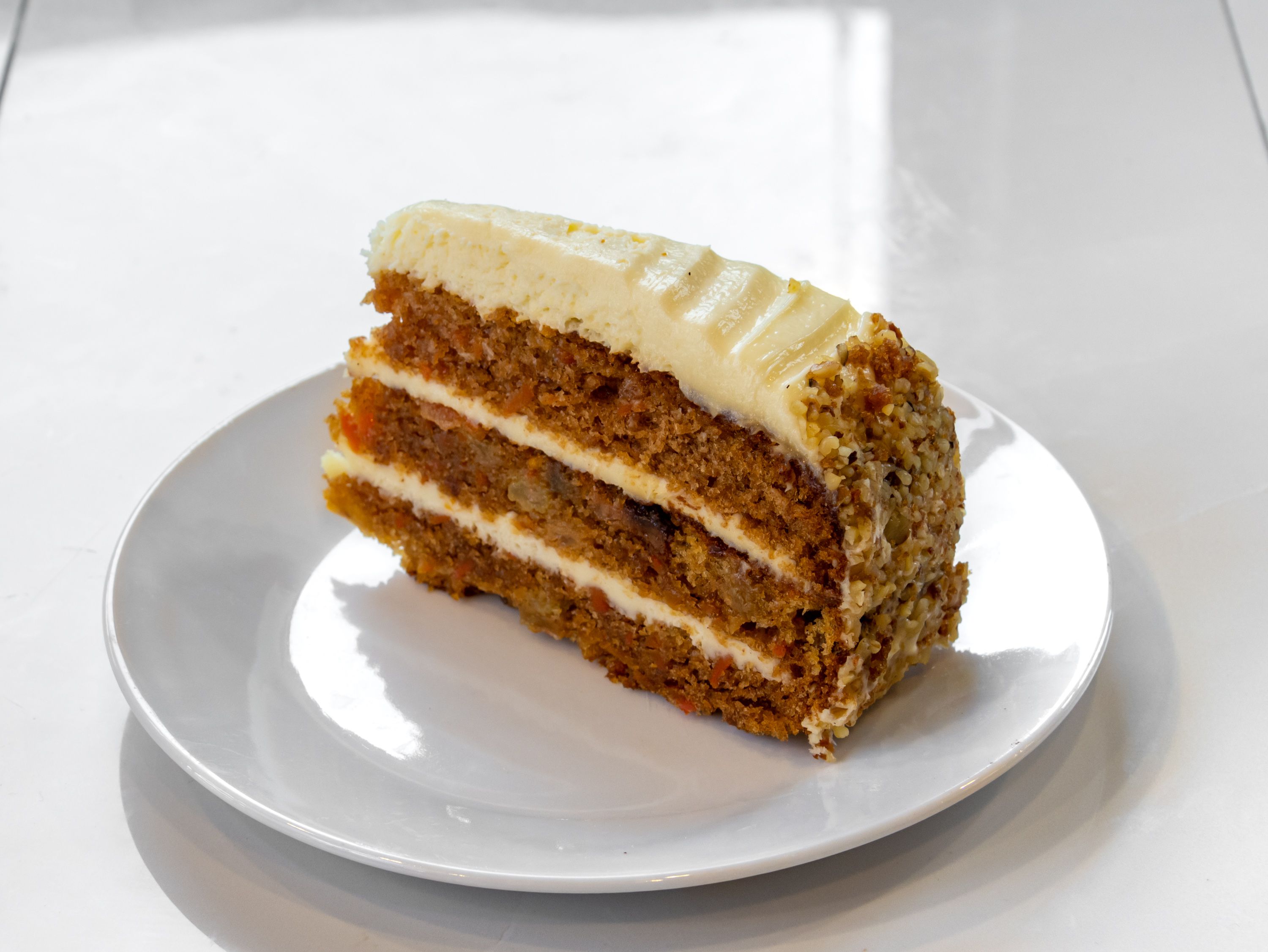 Order Carrot Cake food online from New Yorker Pizza store, Leesburg on bringmethat.com