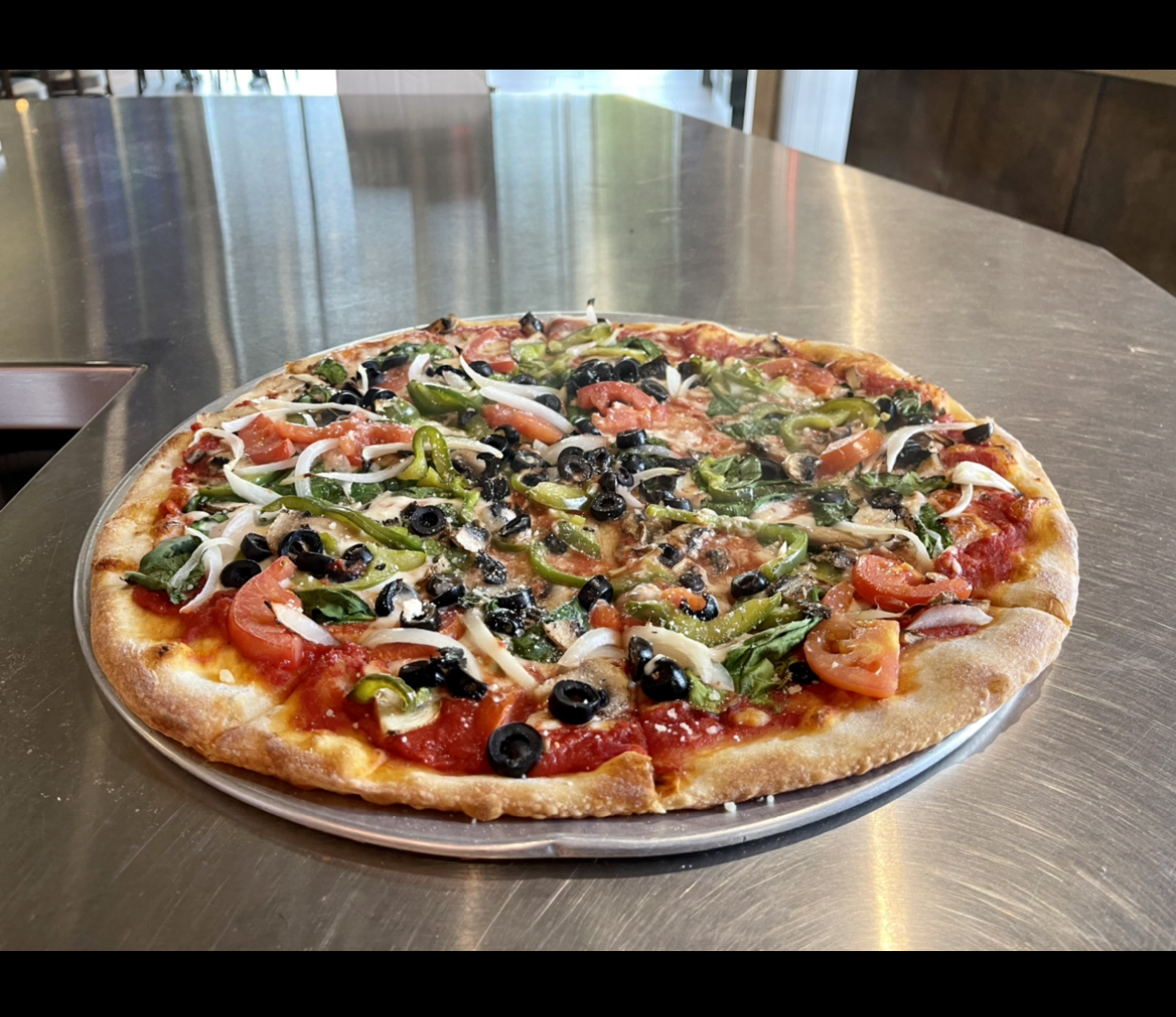 Order Veggie Supreme Pizza food online from Johnny's Pizza store, Cary on bringmethat.com