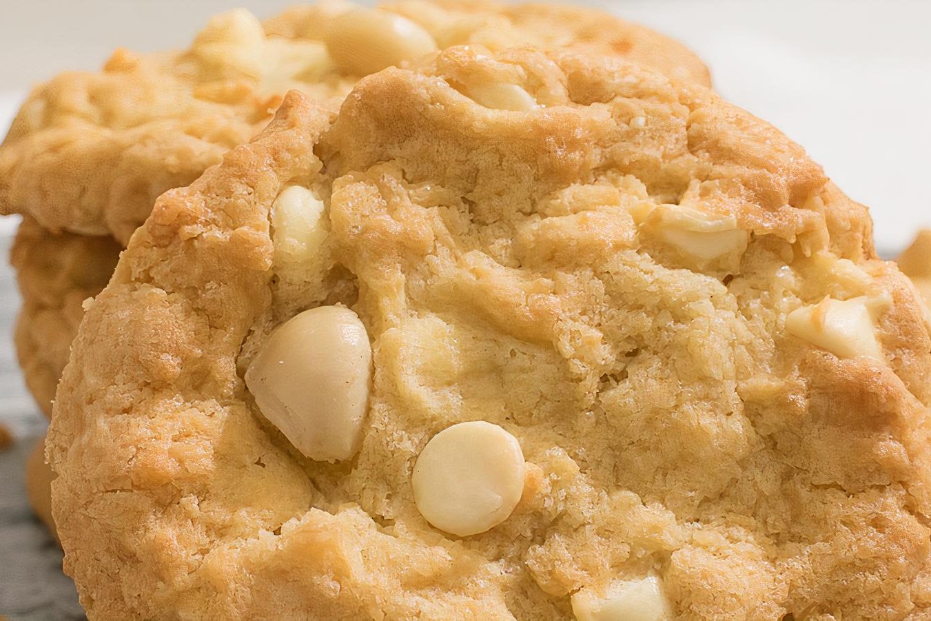 Order White Chocolate Macadamia Cookie food online from Ben & Jerry's store, Plano on bringmethat.com
