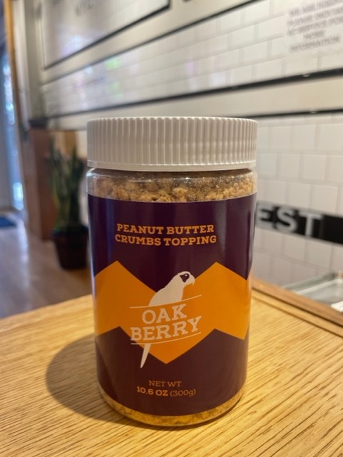 Order Oakberry Peanut Butter Crumbs Topping Jar (10.6 oz) food online from Oakberry Aaí Bowls & Smoothies store, New York on bringmethat.com