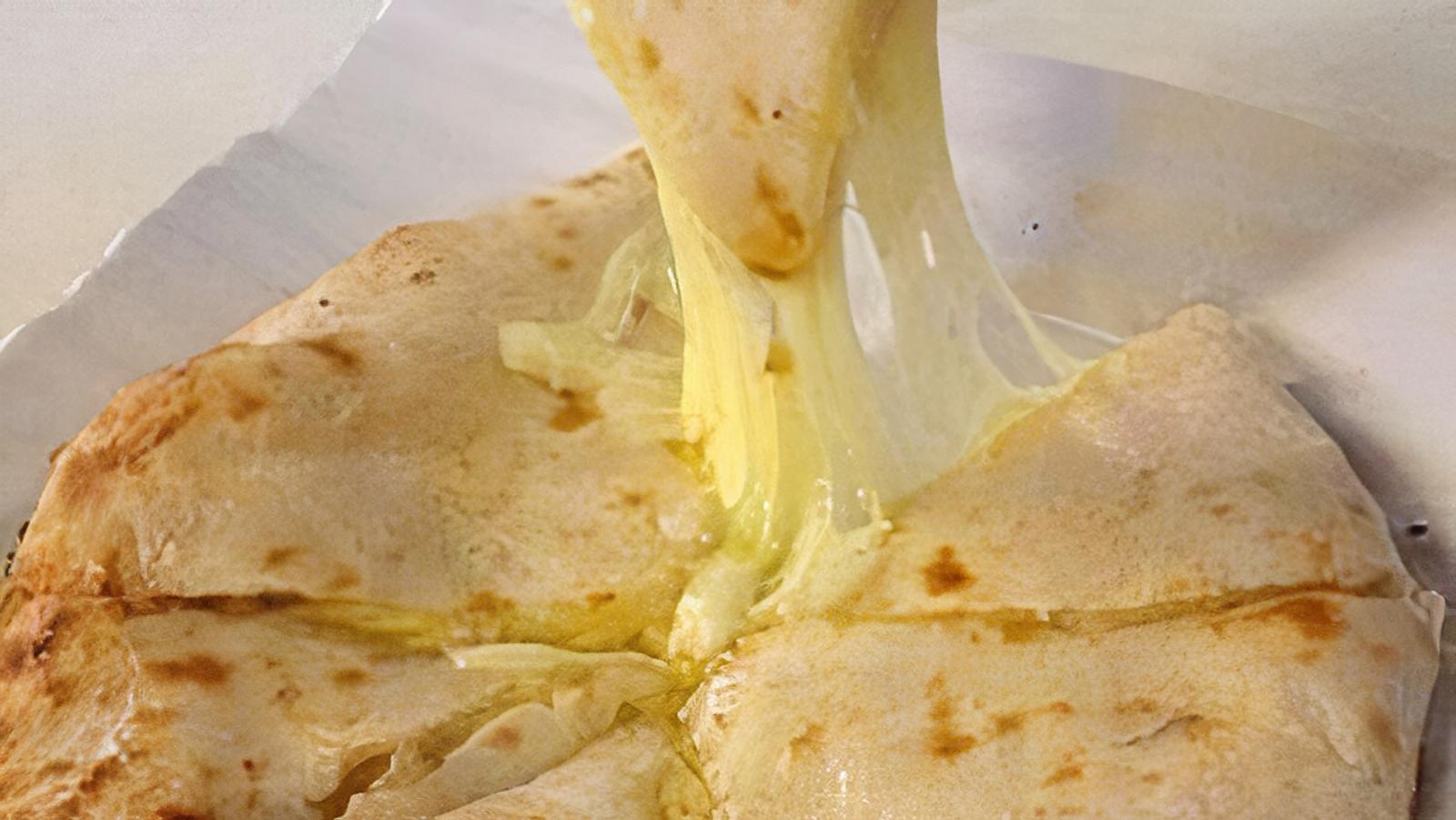 Order Cheese Naan food online from Mandala Indian Cuisine store, Saratoga on bringmethat.com