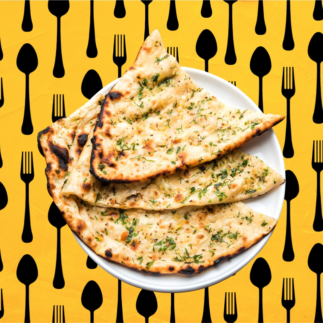 Order Garlic Naan food online from Curry Spoon store, Milton on bringmethat.com