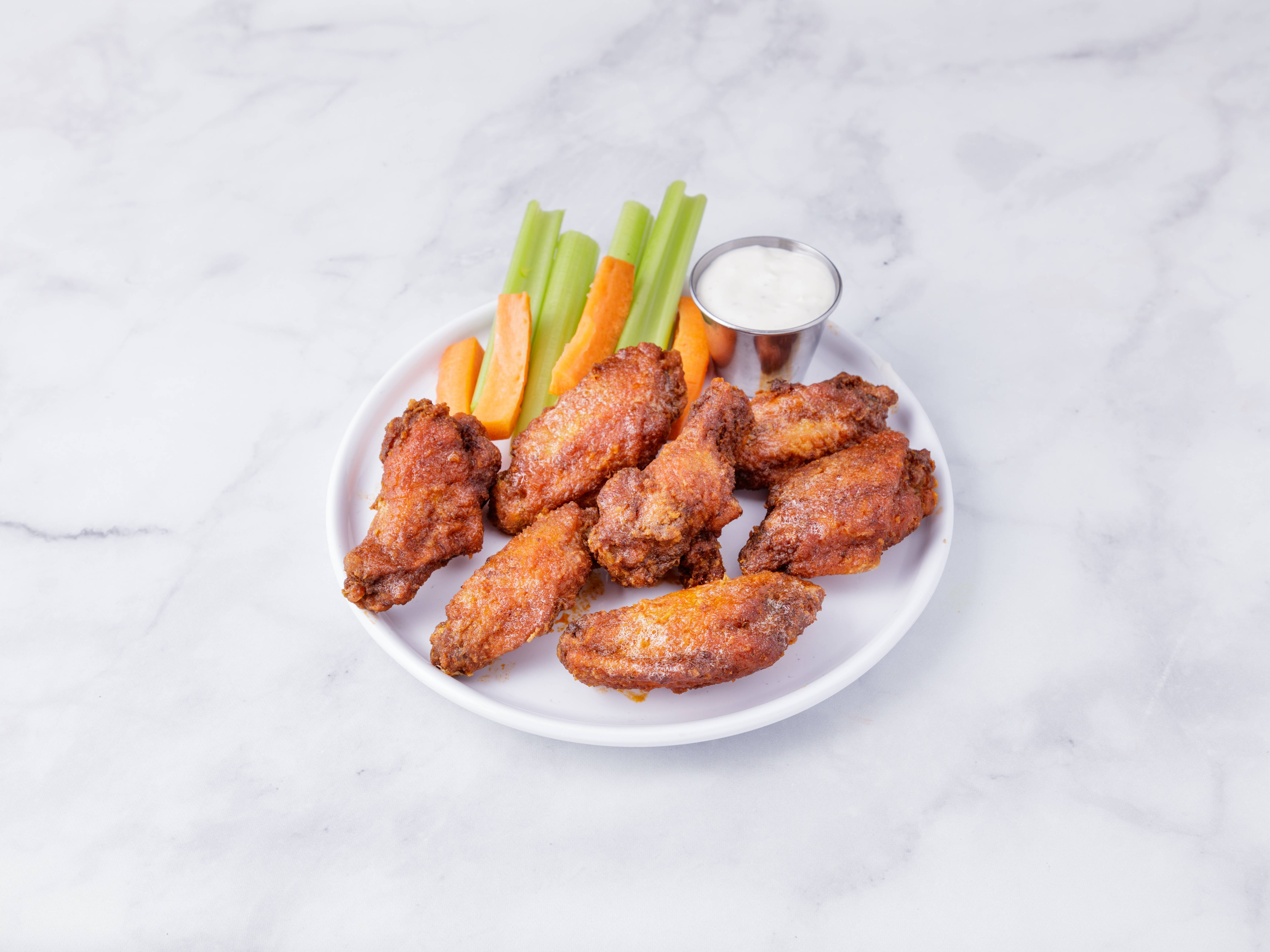 Order Honey Buffalo Wings  food online from The triple crown store, New York on bringmethat.com