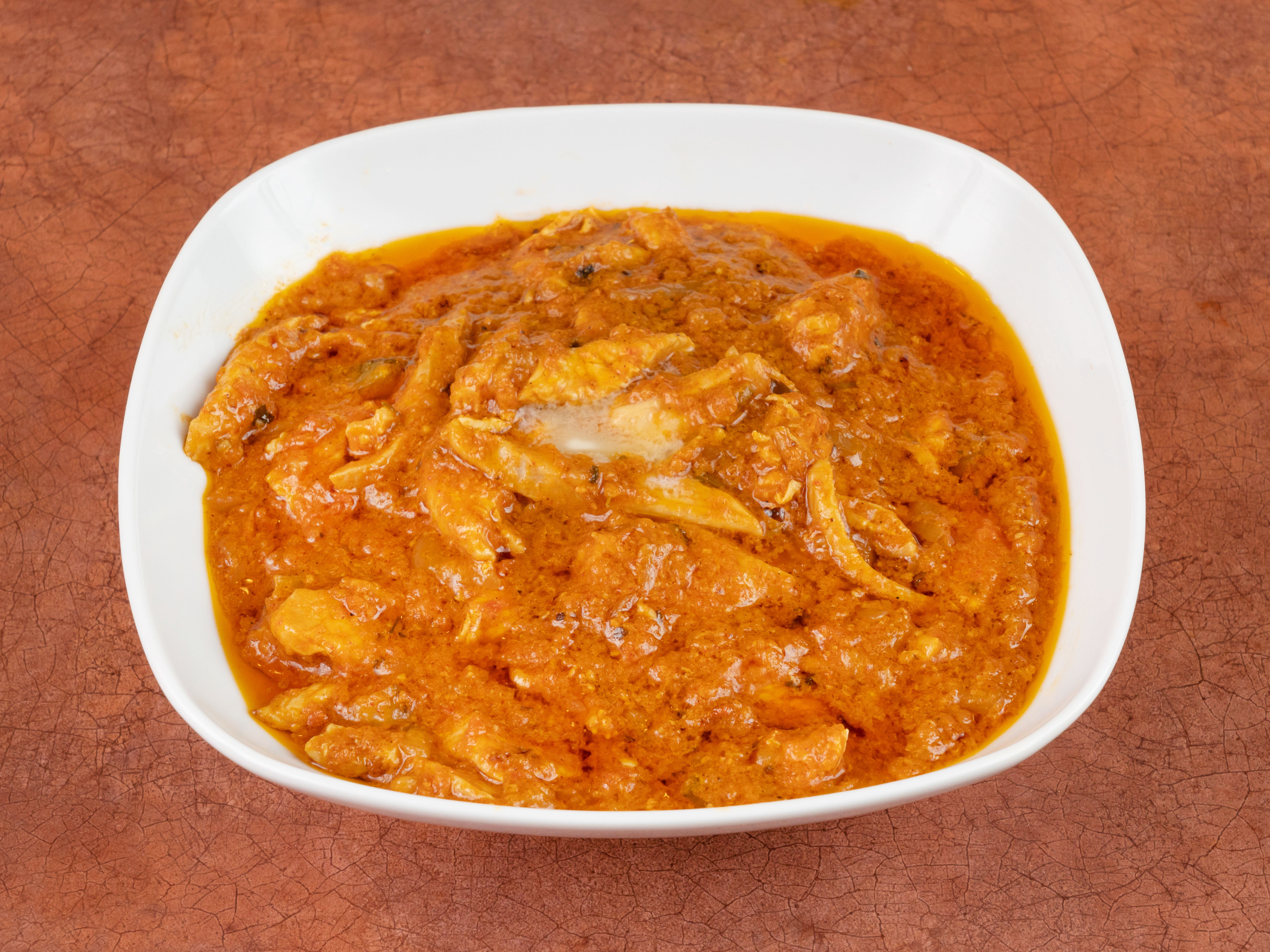 Order Butter Chicken Curry food online from Savoy Restaurant store, Houston on bringmethat.com