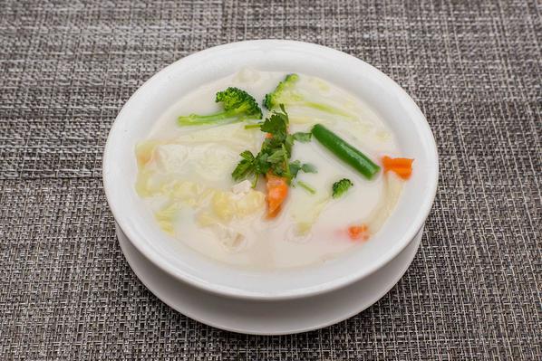 Order Tom Kha Soup food online from Thai Deelish store, Ashburn on bringmethat.com