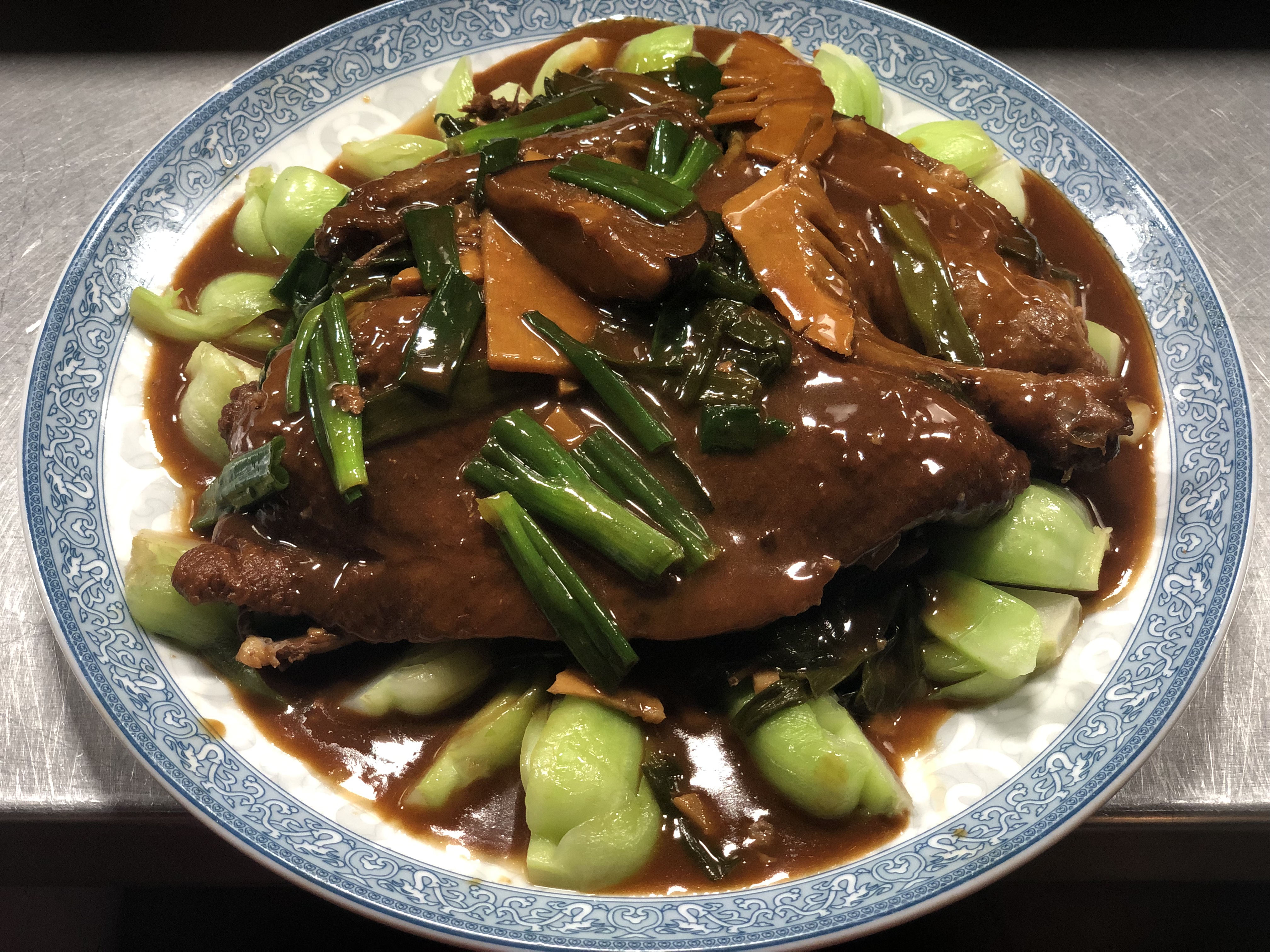 Order E3. Half Braised Duck food online from Mama Wok store, Rockville on bringmethat.com