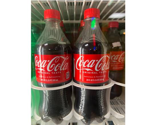 Order Coke Bottle 20 oz food online from Papaya Fresh Deli store, Paterson on bringmethat.com