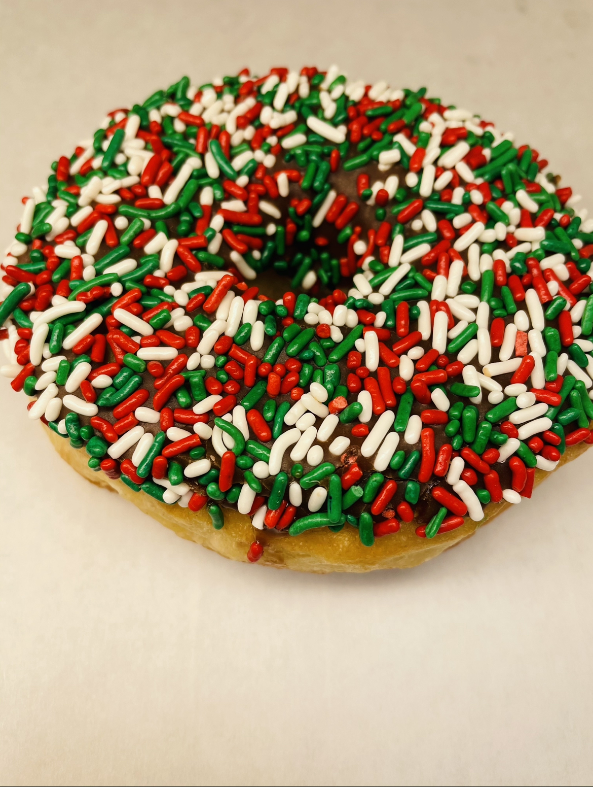 Order Rainbow Sprinkled Donut food online from Boston Donuts store, Fitchburg on bringmethat.com