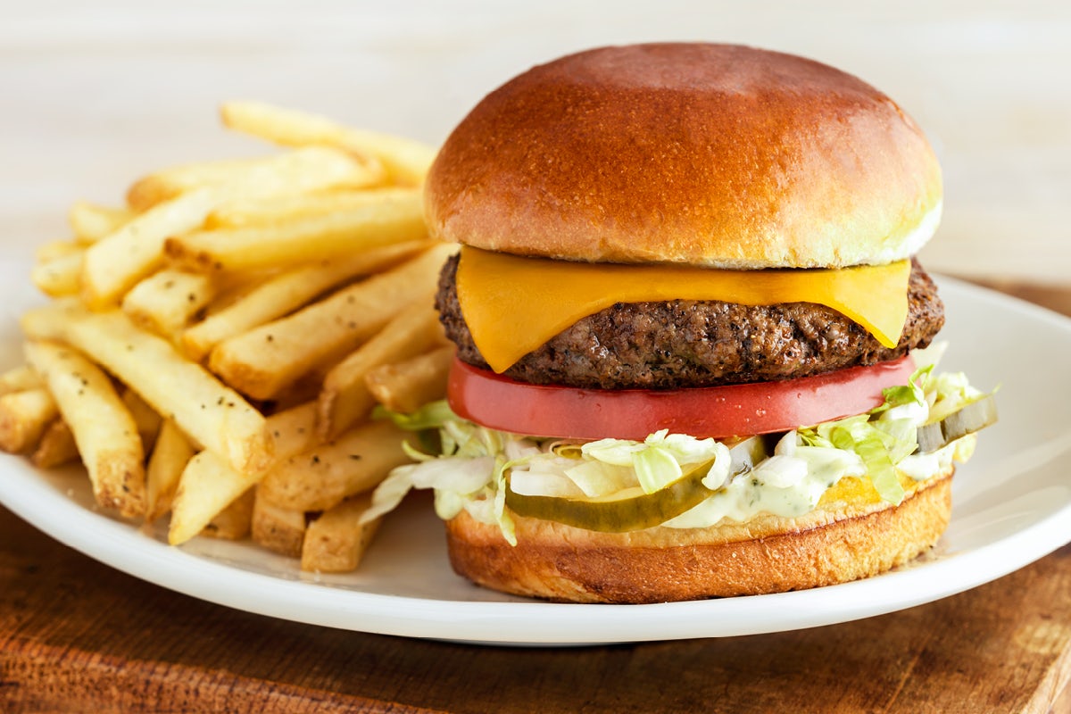 Order The Outbacker Burger* food online from Outback Steakhouse store, Atlanta on bringmethat.com