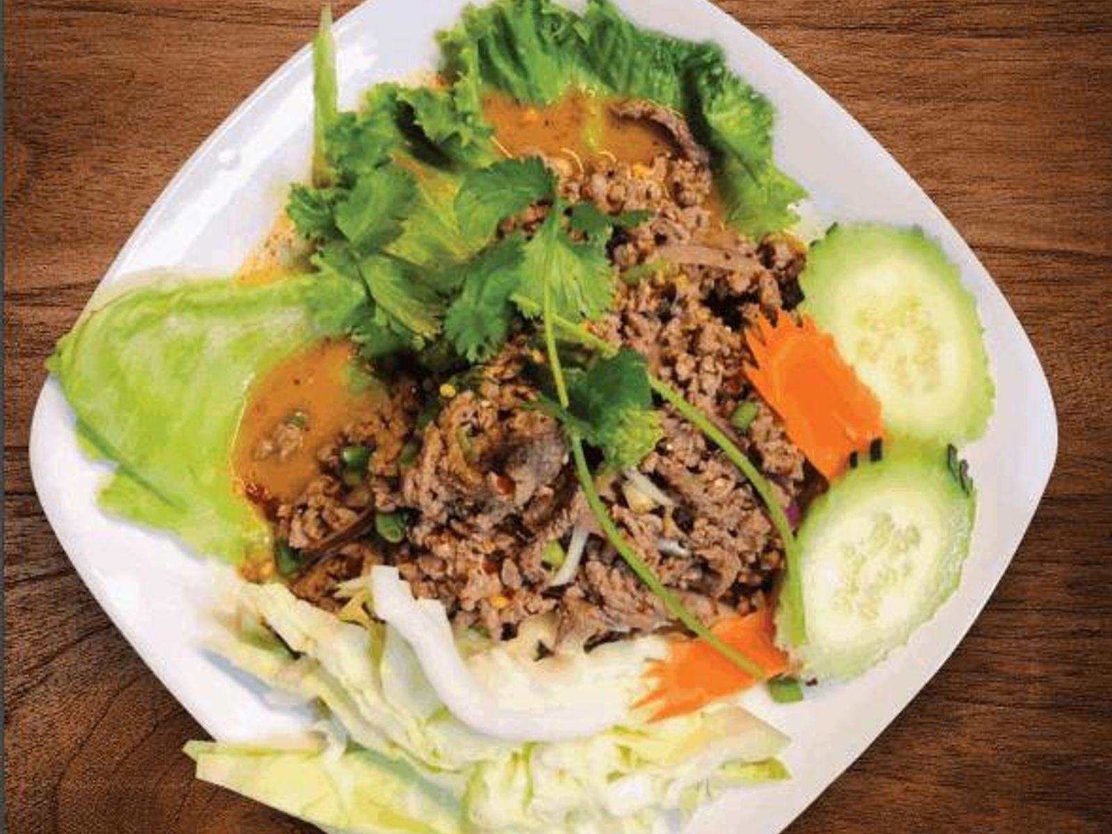 Order 11. Larb food online from Meesen Thai Eatery store, Portland on bringmethat.com