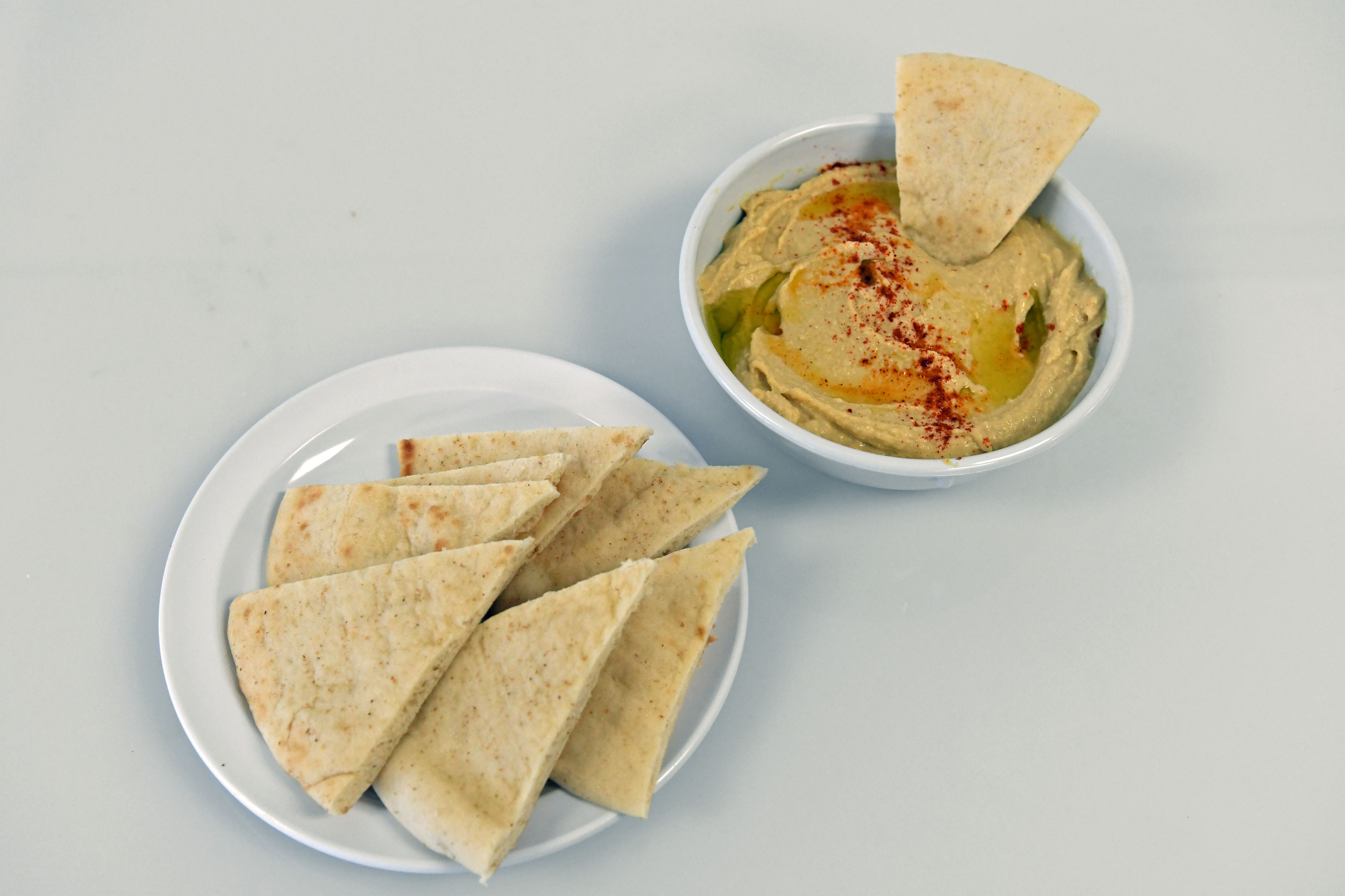 Order Hummus & Pita Bread food online from Your Greek Cousin store, West Palm Beach on bringmethat.com