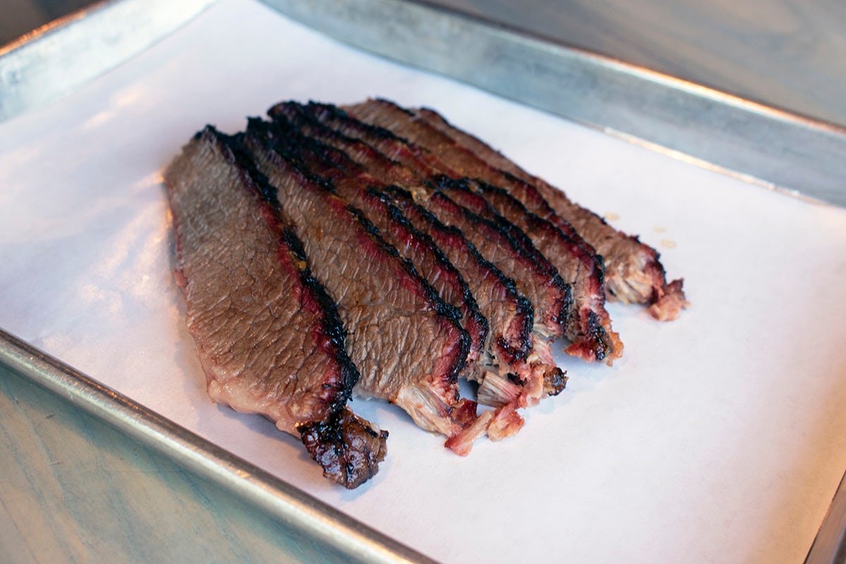 Order 14 Hour Smoked & Sliced Brisket (1 LB) food online from Real Urban BBQ store, Vernon Hills on bringmethat.com
