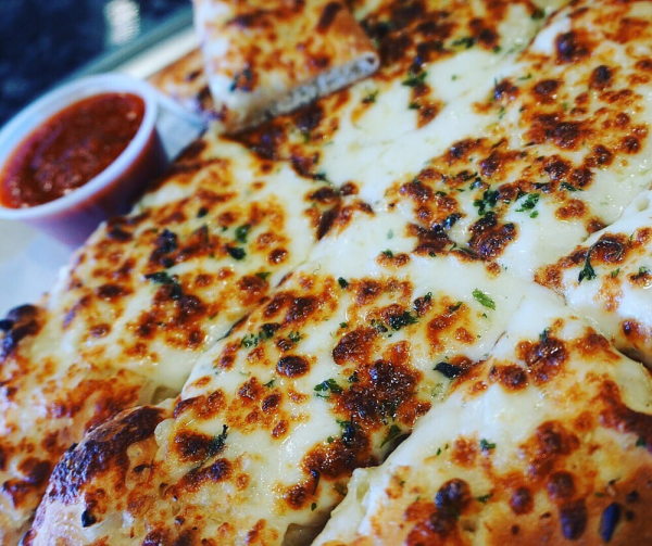 Order Garlic Cheese Bread Sticks food online from The Pizzeria Factory store, Winnetka on bringmethat.com