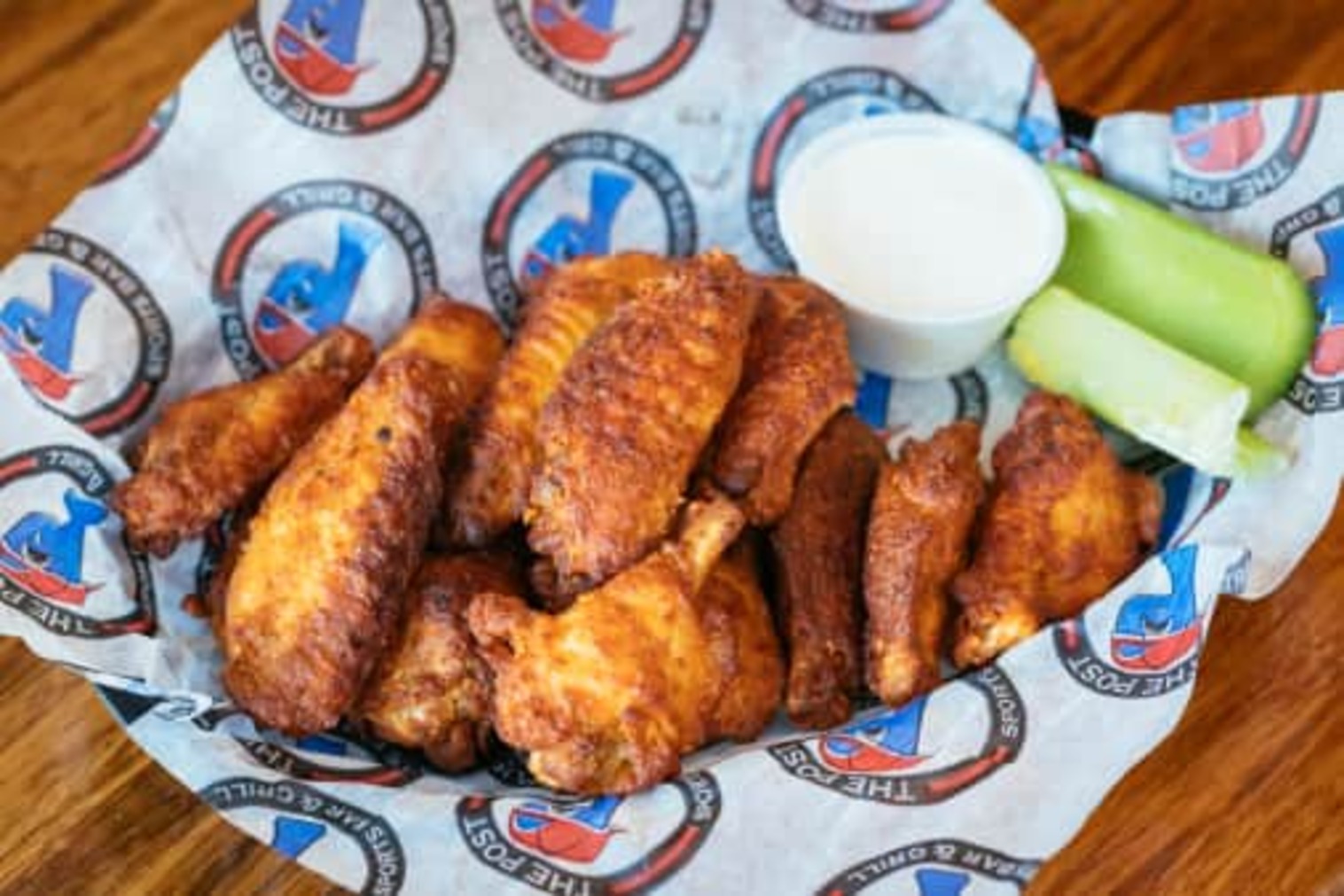 Order Wings -1 lb food online from The Post Sports Bar & Grill store, Creve Coeur on bringmethat.com