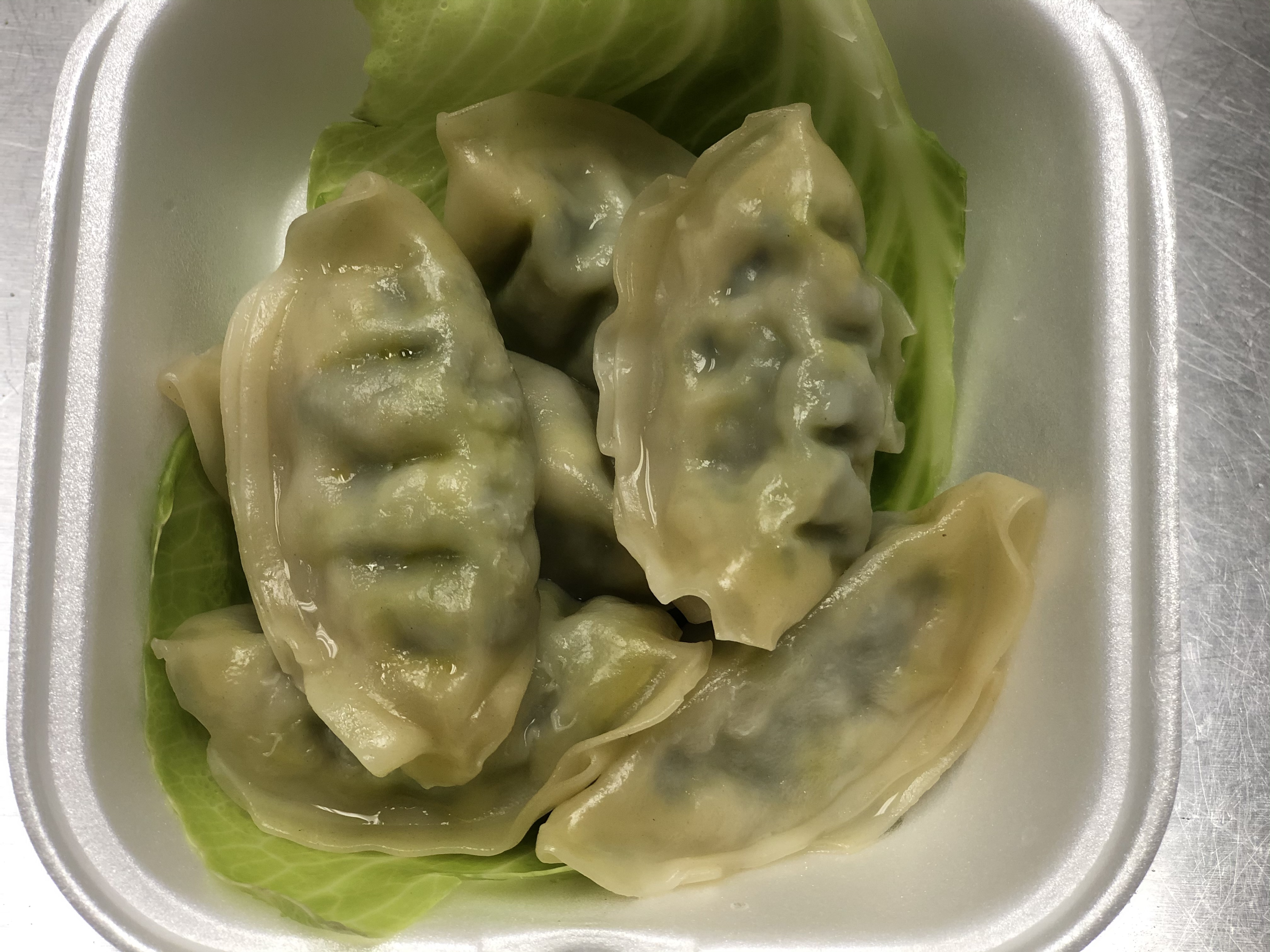 Order 6 Steamed Vegetable Dumplings food online from Panda Kitchen store, Houston on bringmethat.com