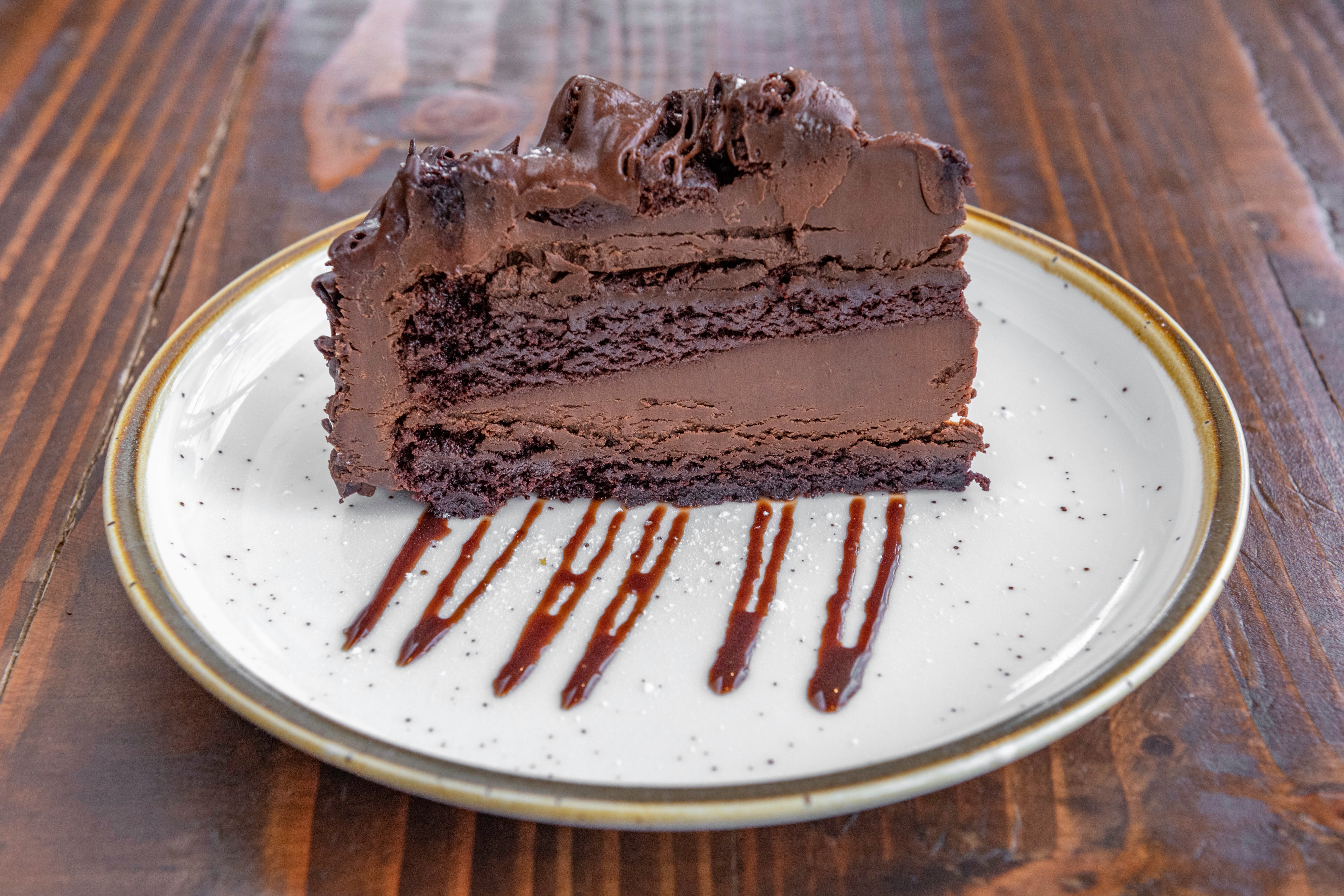 Order Chocolate Cake - 1 Piece food online from Panini Grill store, Staten Island on bringmethat.com