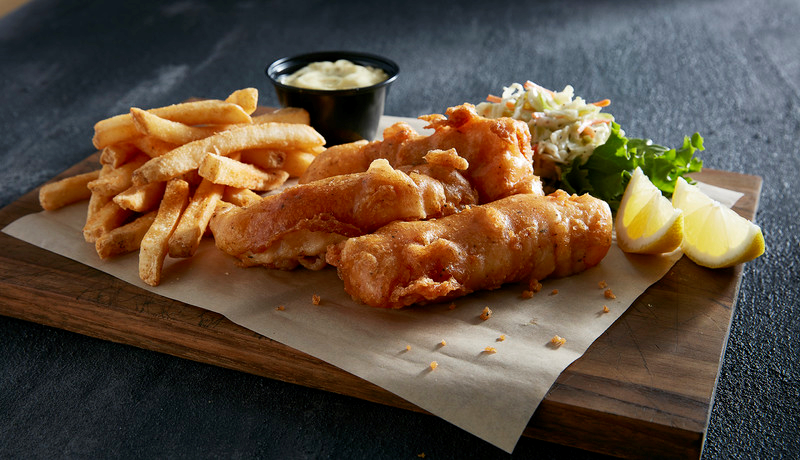 Order Beer-Battered Fish and Chips food online from Tilted Kilt store, Prince George on bringmethat.com