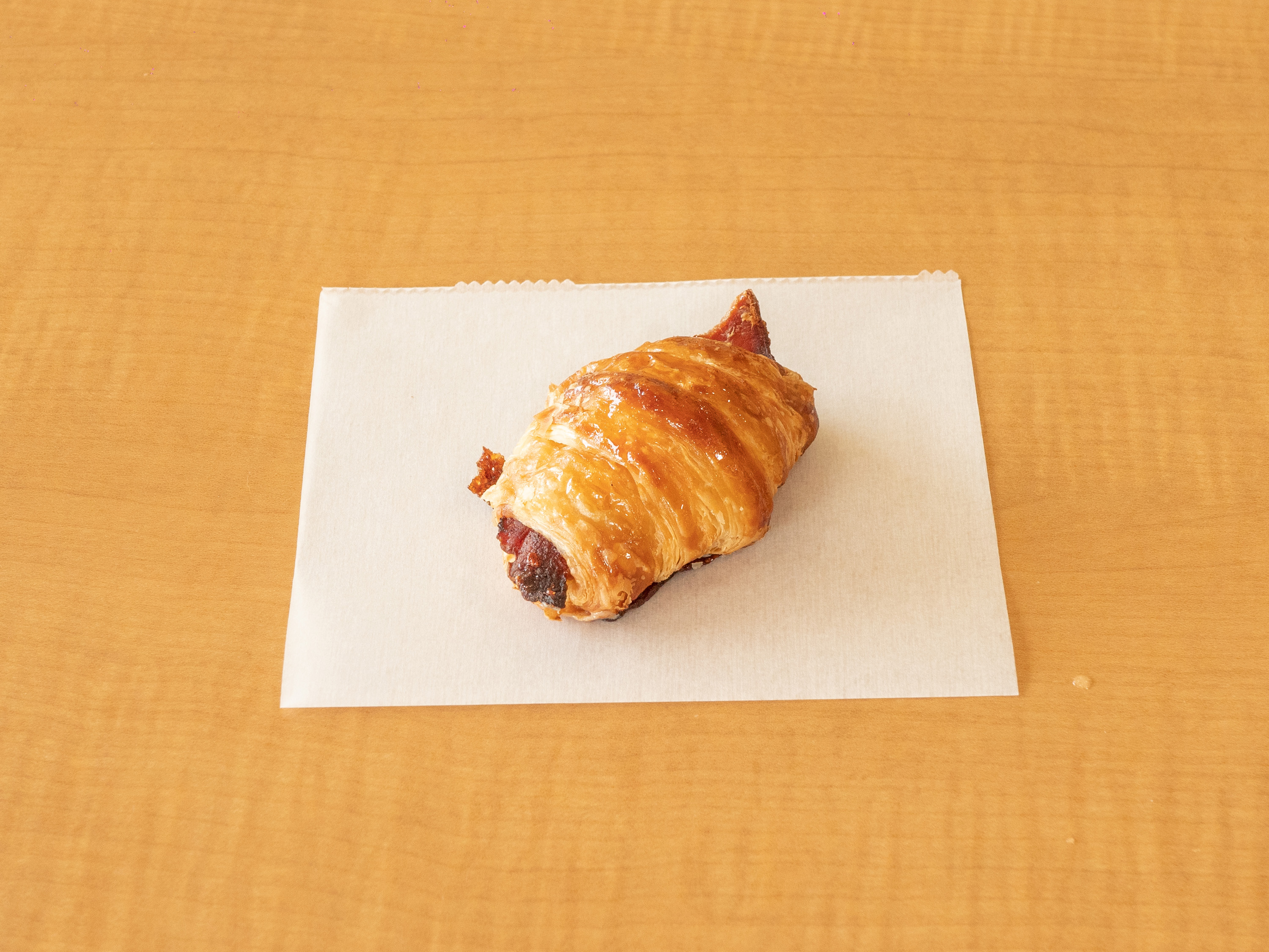 Order 1 Dozen Bacon and Cheese Croissant Rolls food online from Sara Donuts store, Euless on bringmethat.com
