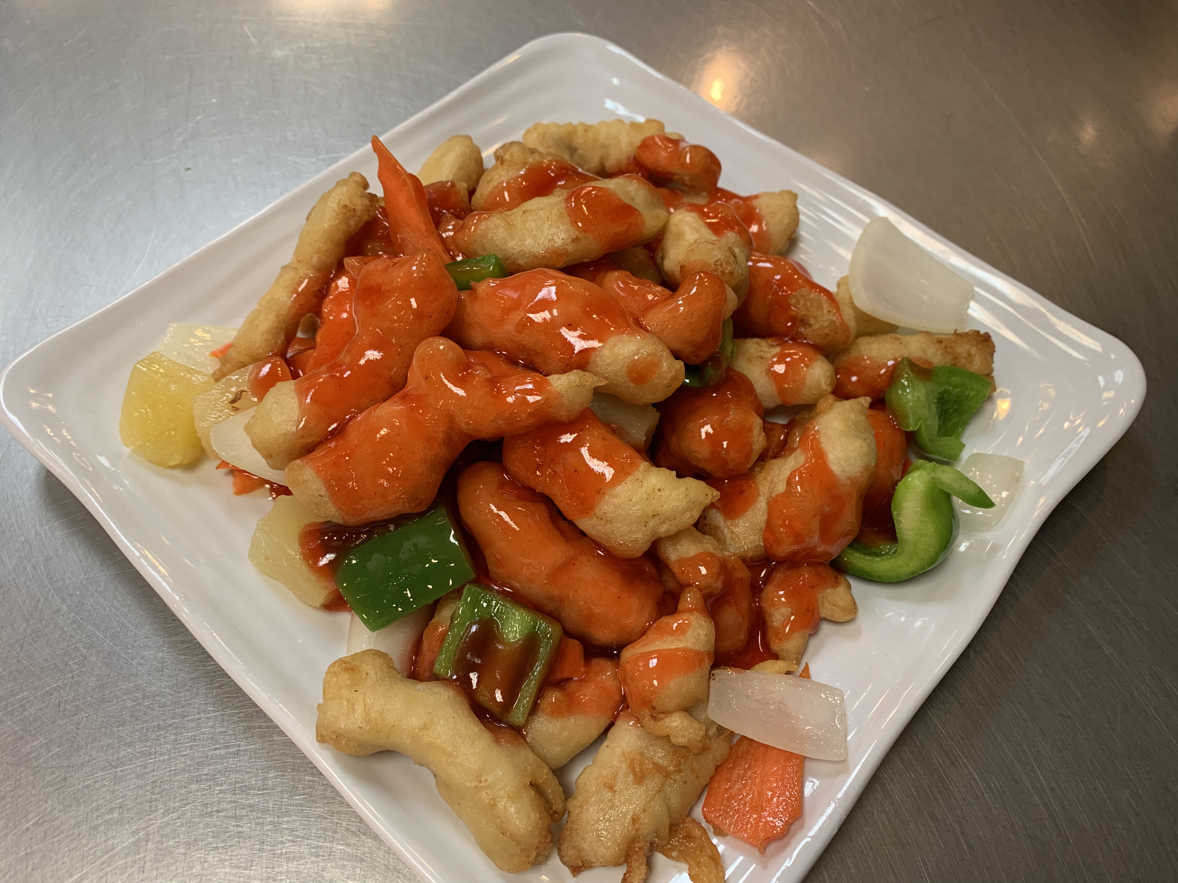 Order Sweet and Sour Chicken Entree food online from China A Go Go store, Las Vegas on bringmethat.com
