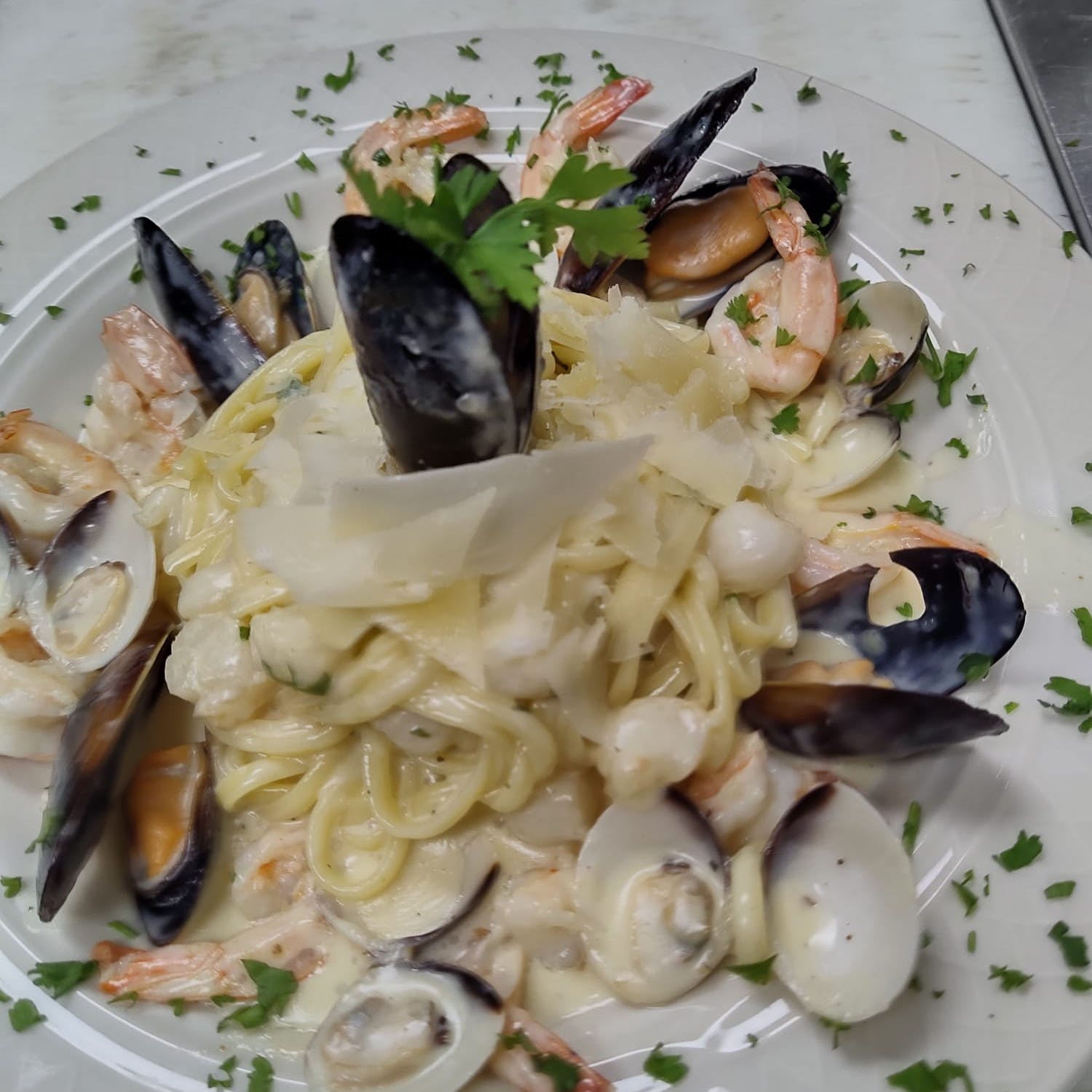 Order 10. Seafood Pasta - Pasta food online from Bells Pizza Company store, Bellflower on bringmethat.com