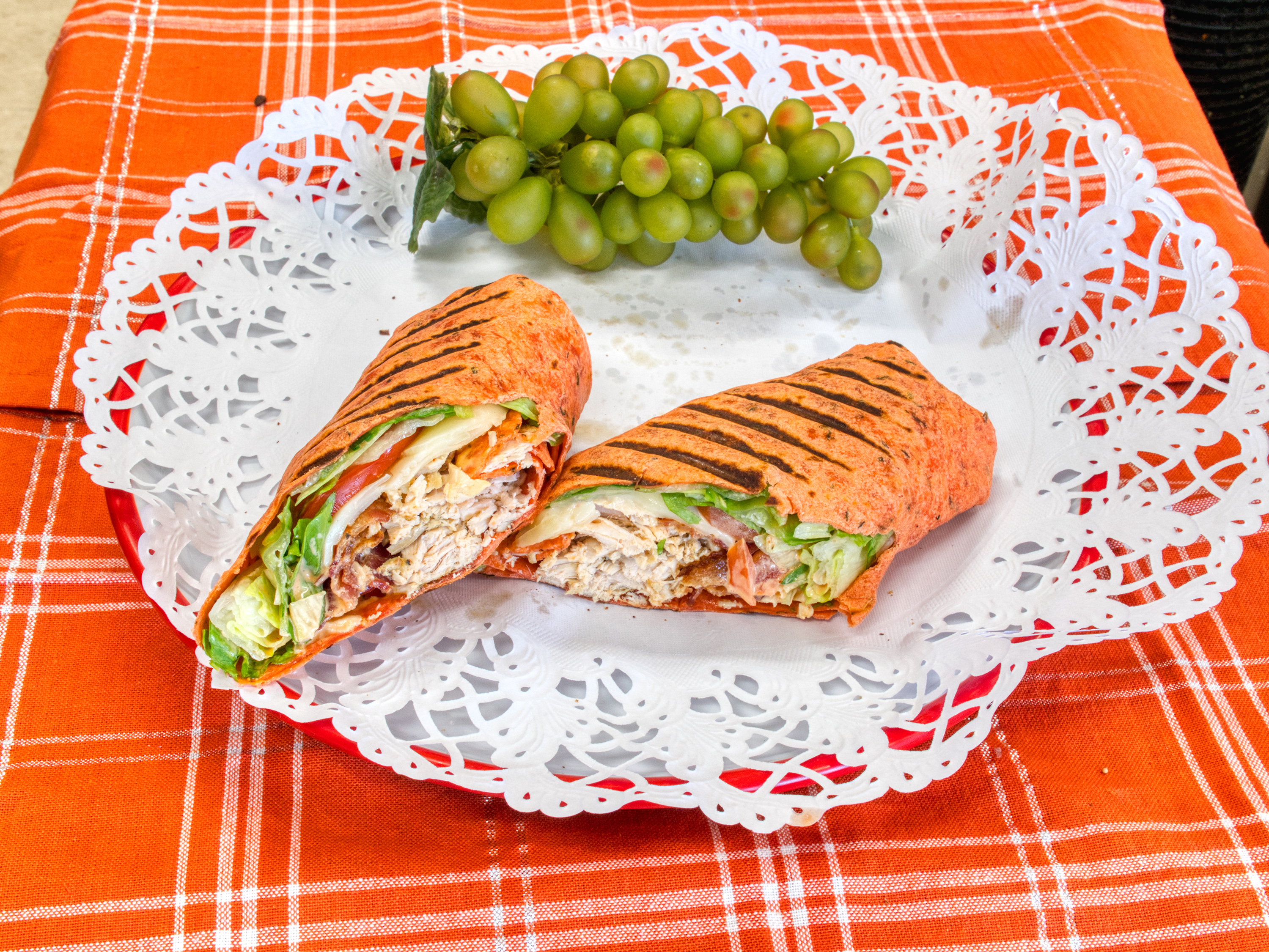 Order Chicken Pesto Wrap food online from Nicko Cafe & Deli store, Oakbrook Terrace on bringmethat.com