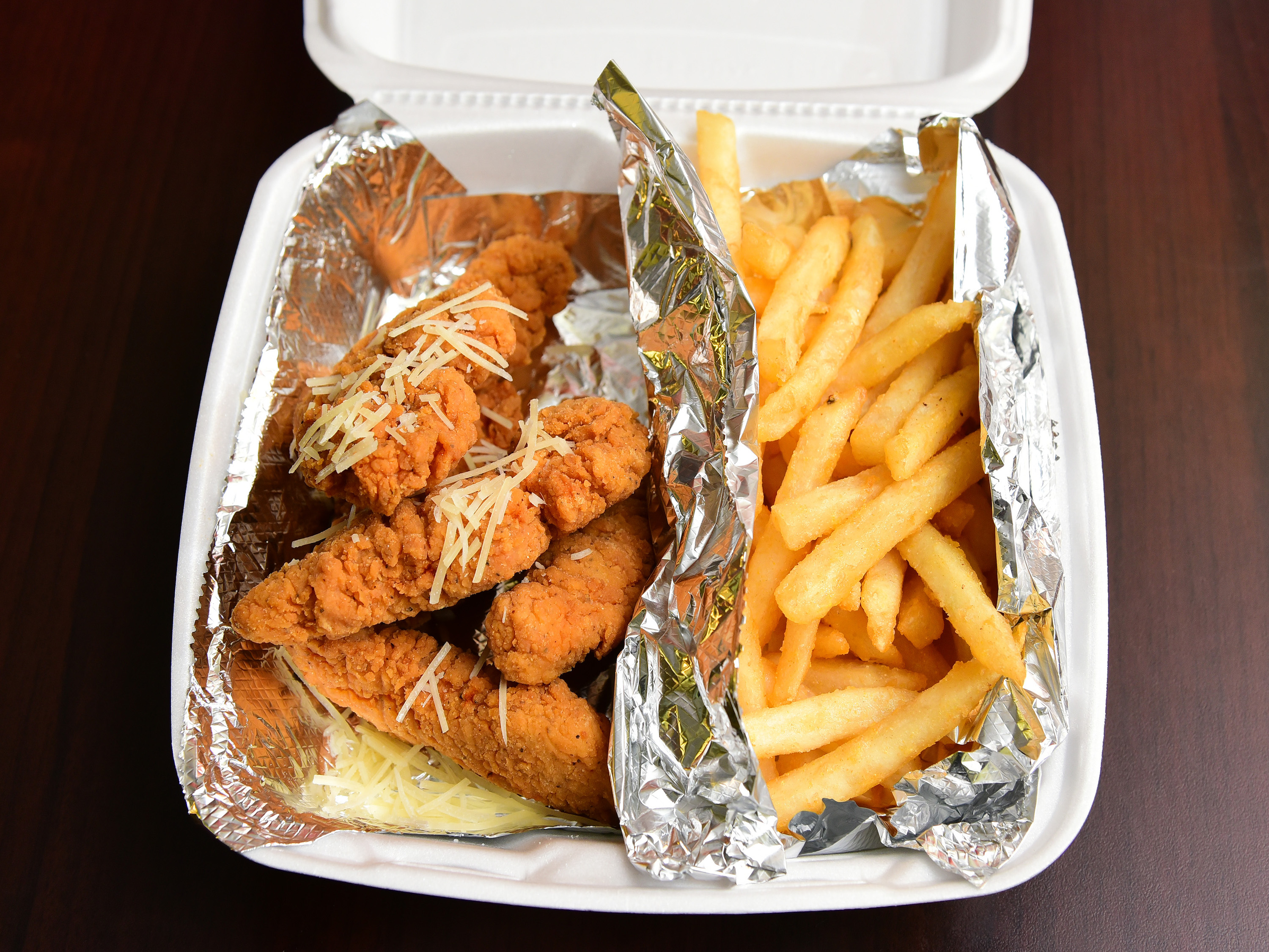 Order Chicken Strips with French Fries food online from Ithaca Pasta Bravo's store, Freeville on bringmethat.com