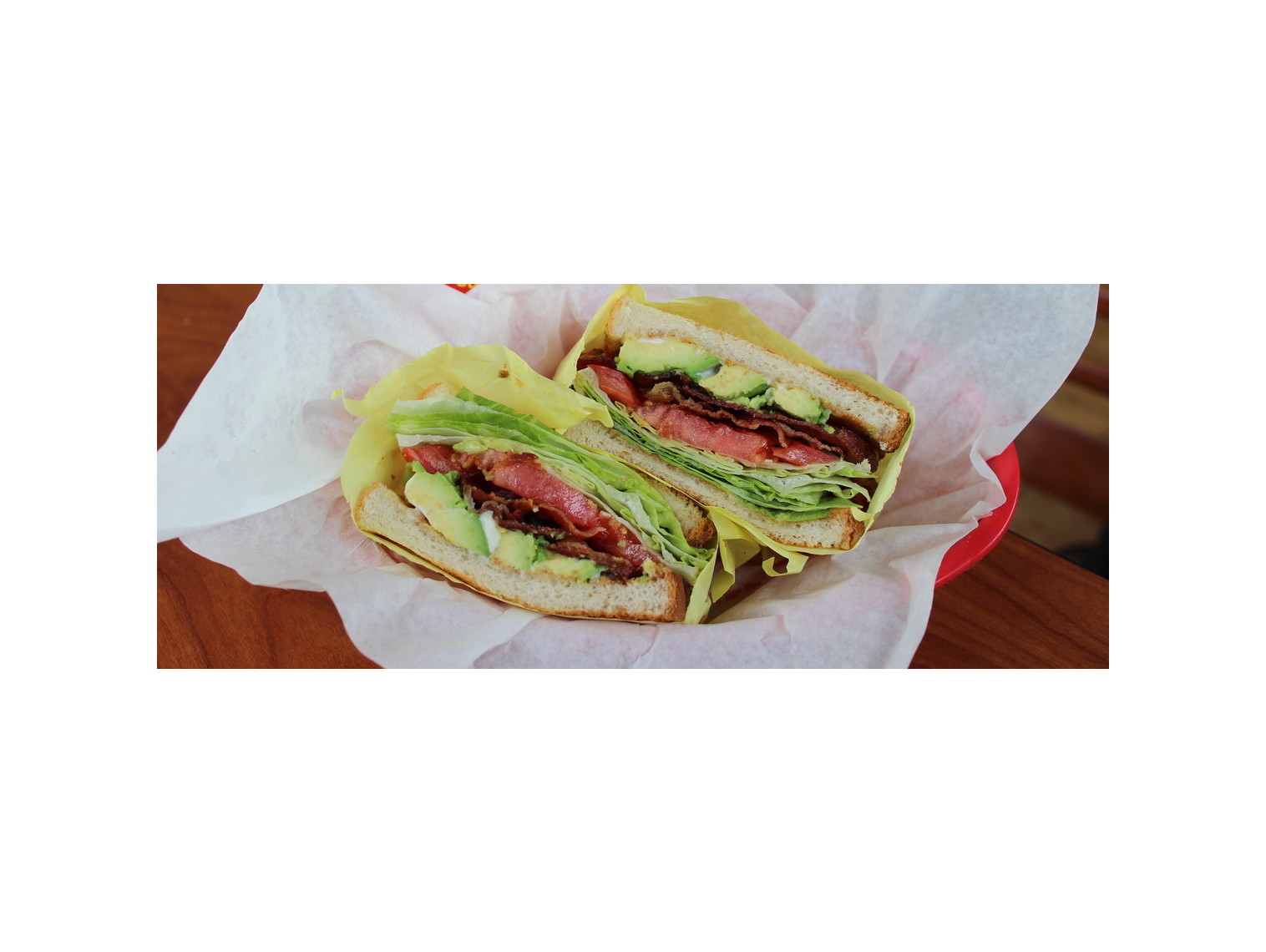 Order Avocado BLT Sandwich food online from Norm Famous Burgers store, Whittier on bringmethat.com