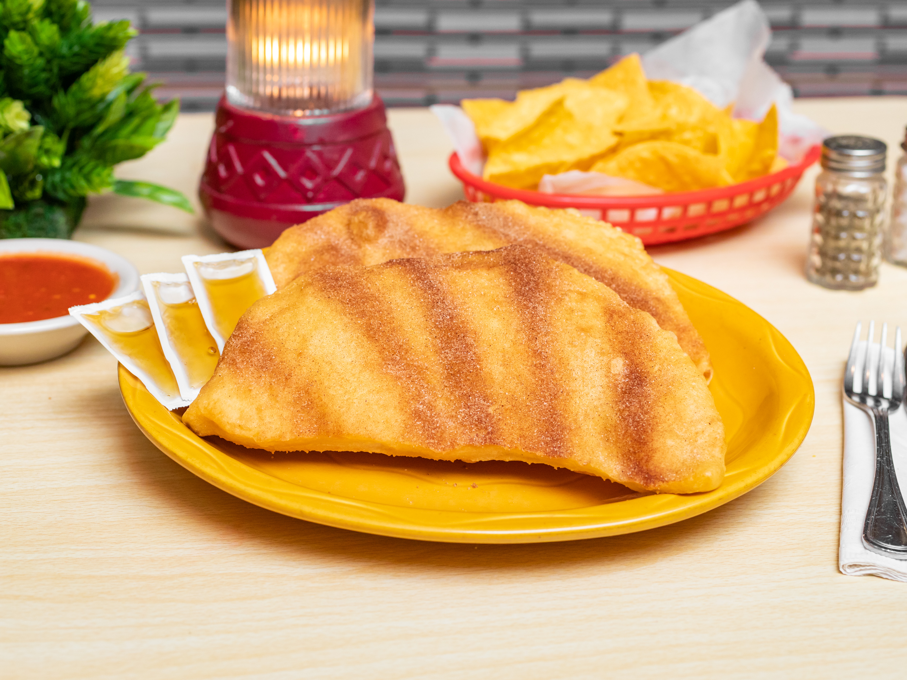 Order Honey Sopapilla food online from Alberto Mexican Restaurant store, Greeley on bringmethat.com