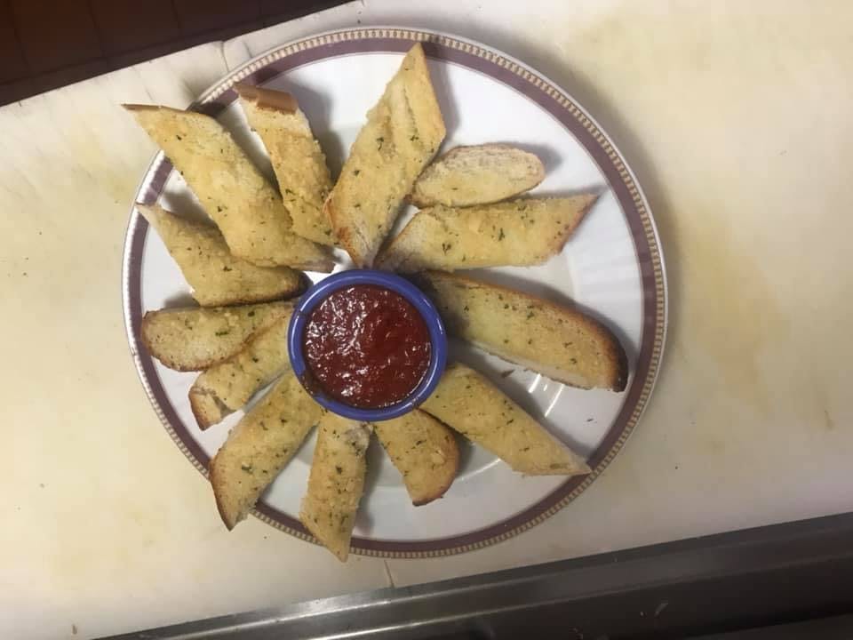 Order Garlic Bread - Appetizer food online from 4 Brothers Pizzeria & Restaurant store, Greenwood Lake on bringmethat.com