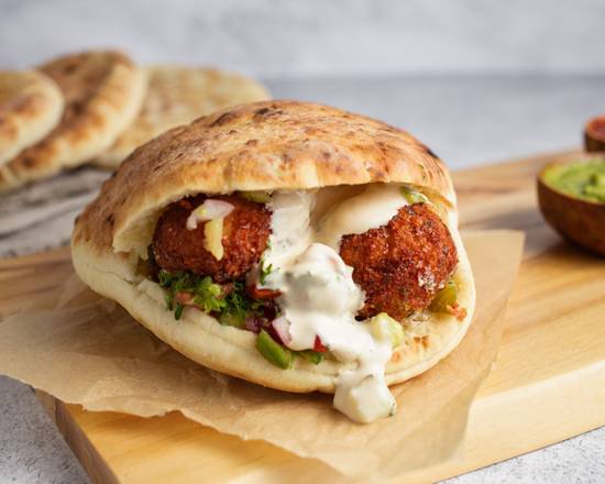 Order Falafel Pita Sandwich by Oren's Hummus food online from Smitten Ice Cream store, Daly City on bringmethat.com