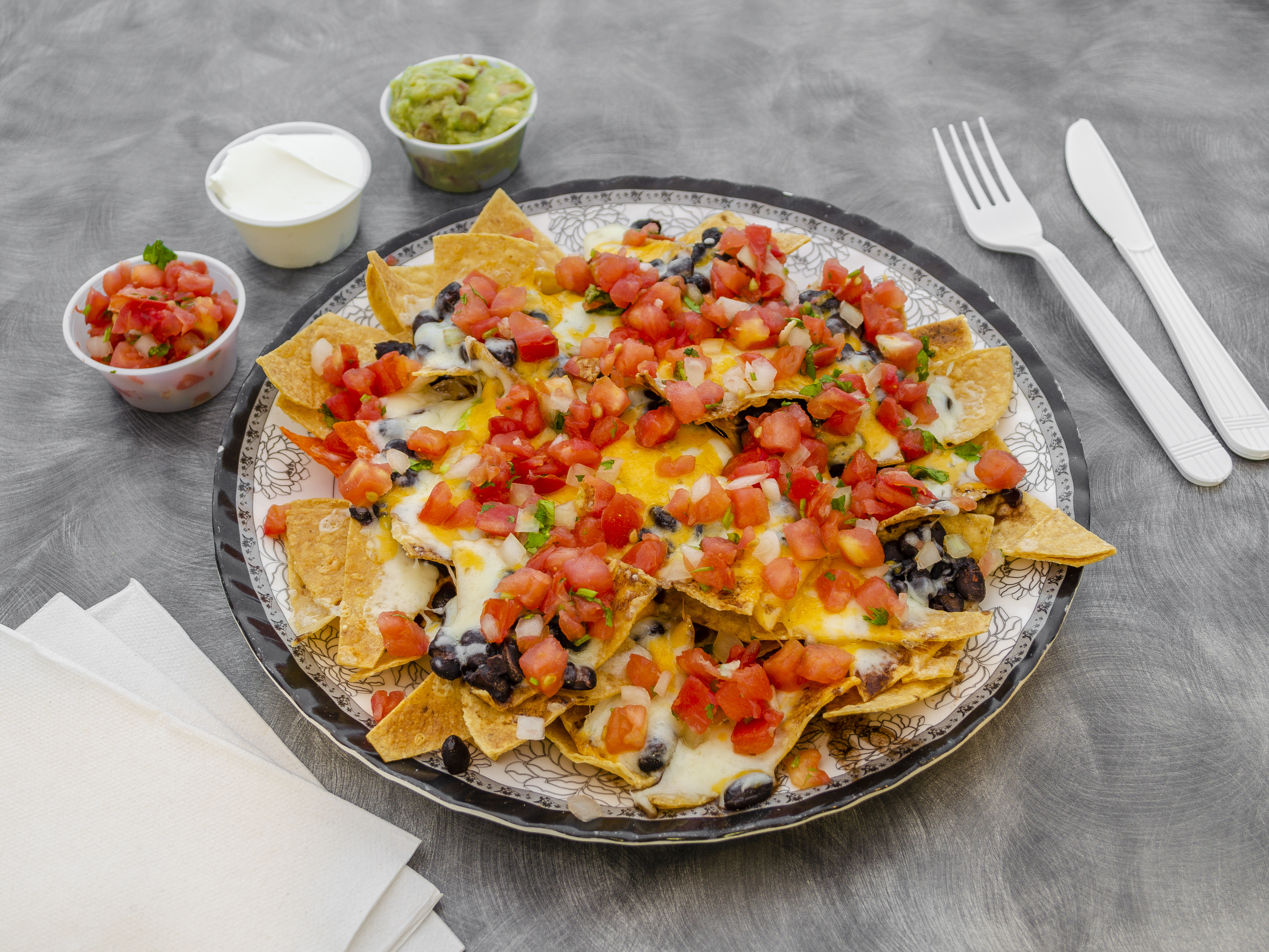 Order Nachos with Veggie food online from Pinatas Mexican Grill store, Massapequa Park on bringmethat.com