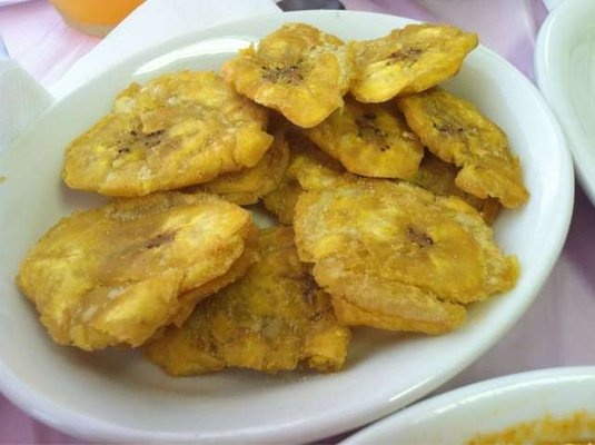 Order 20. Fried Green Plantain food online from Good chinese restaurant store, Brooklyn on bringmethat.com