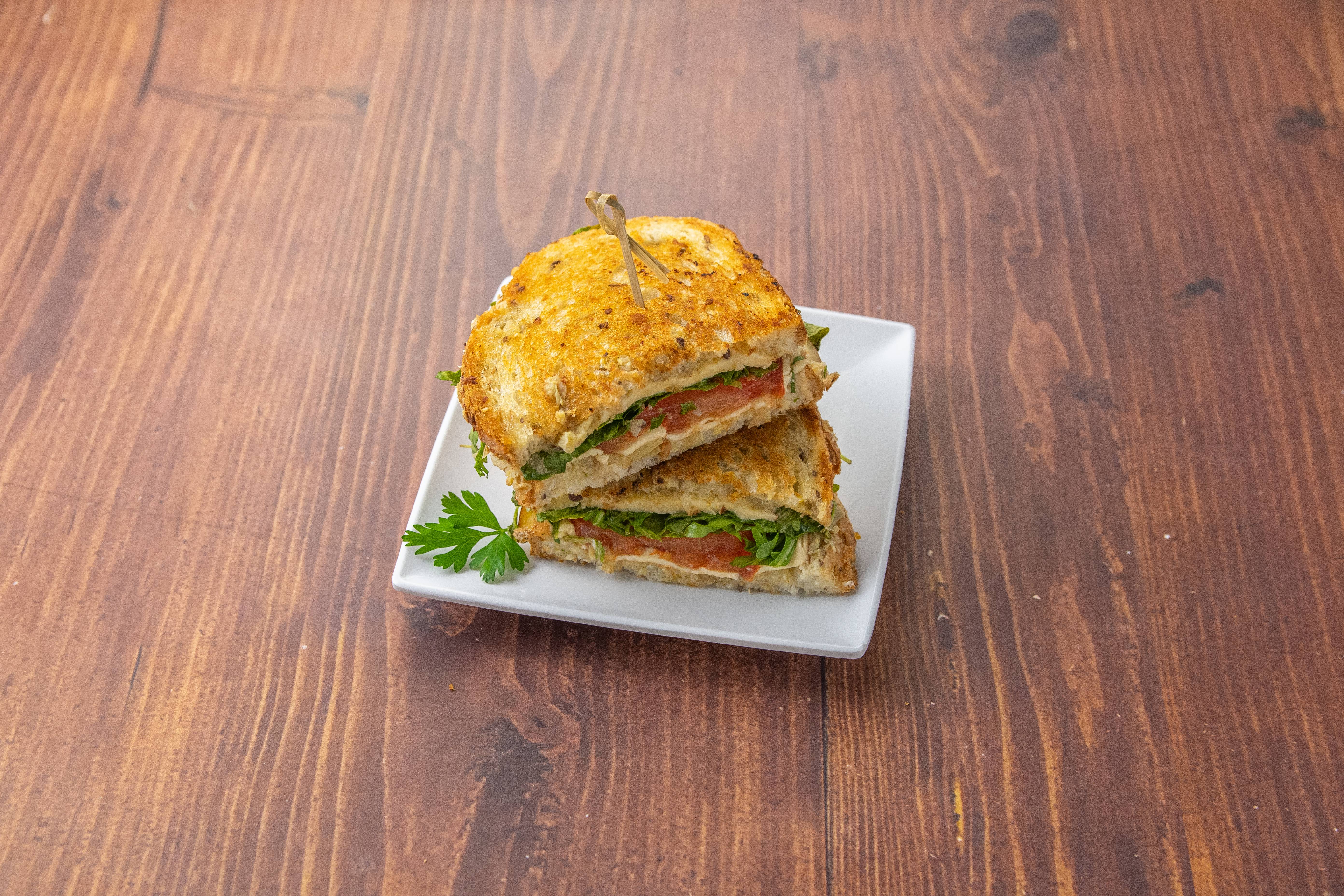 Order Artichoke and Gouda Grilled Cheese food online from Mead Green Door Cafe store, Orange on bringmethat.com