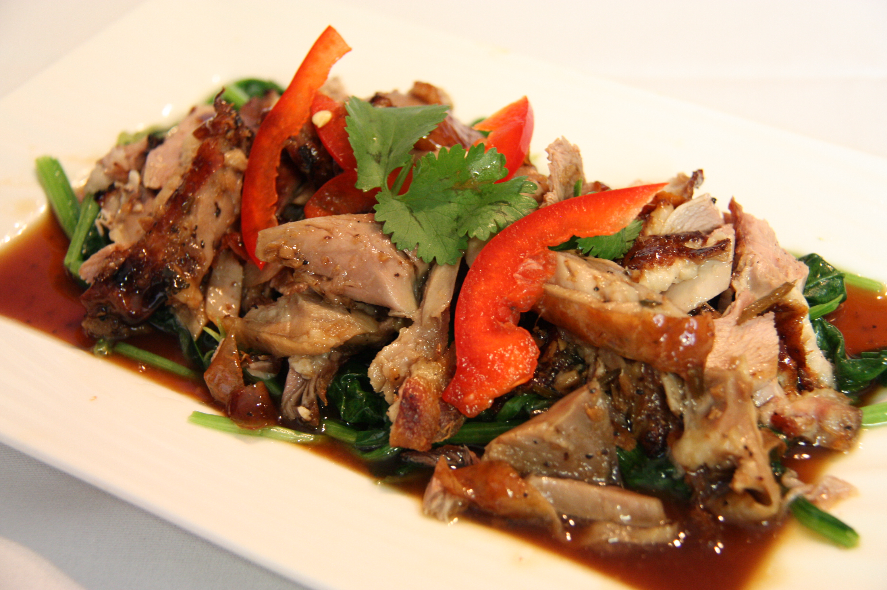 Order Roasted Duck Over Spinach food online from Ploy Ii-Thai Cuisine store, San Francisco on bringmethat.com