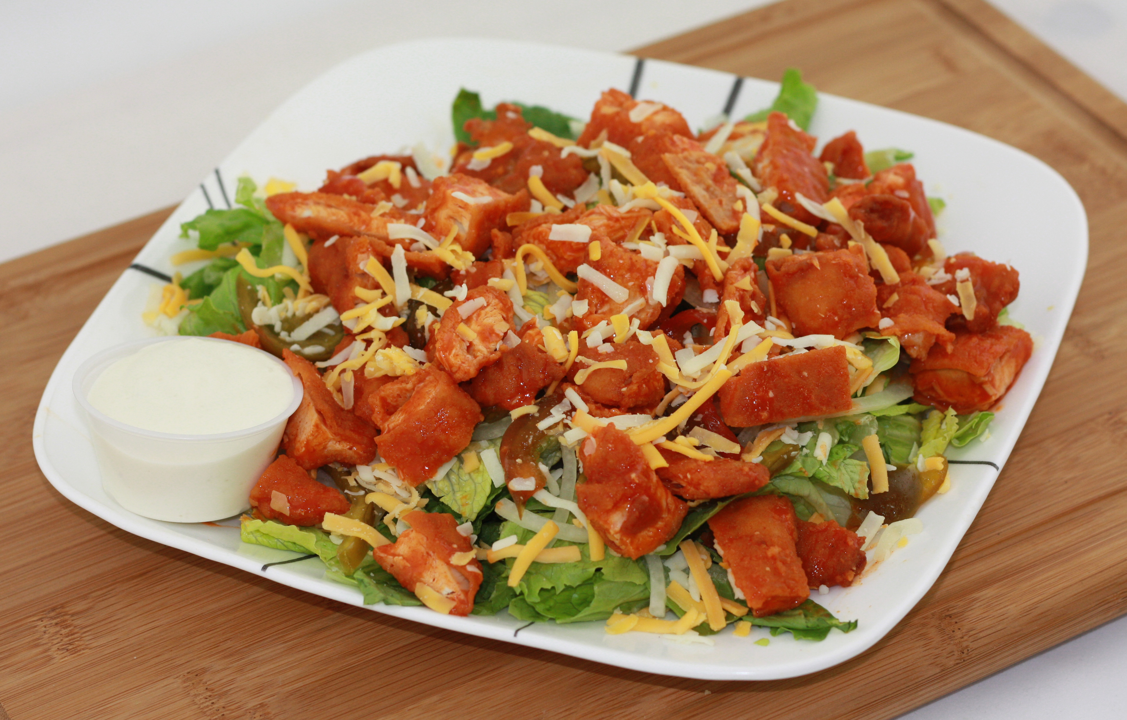 Order Buffalo Chicken Salad food online from Phil Deli & Market store, Cherry Hill on bringmethat.com