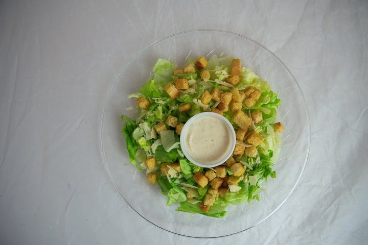 Order Caesar Salad - Small food online from Pizza Pie Me store, Arlington on bringmethat.com
