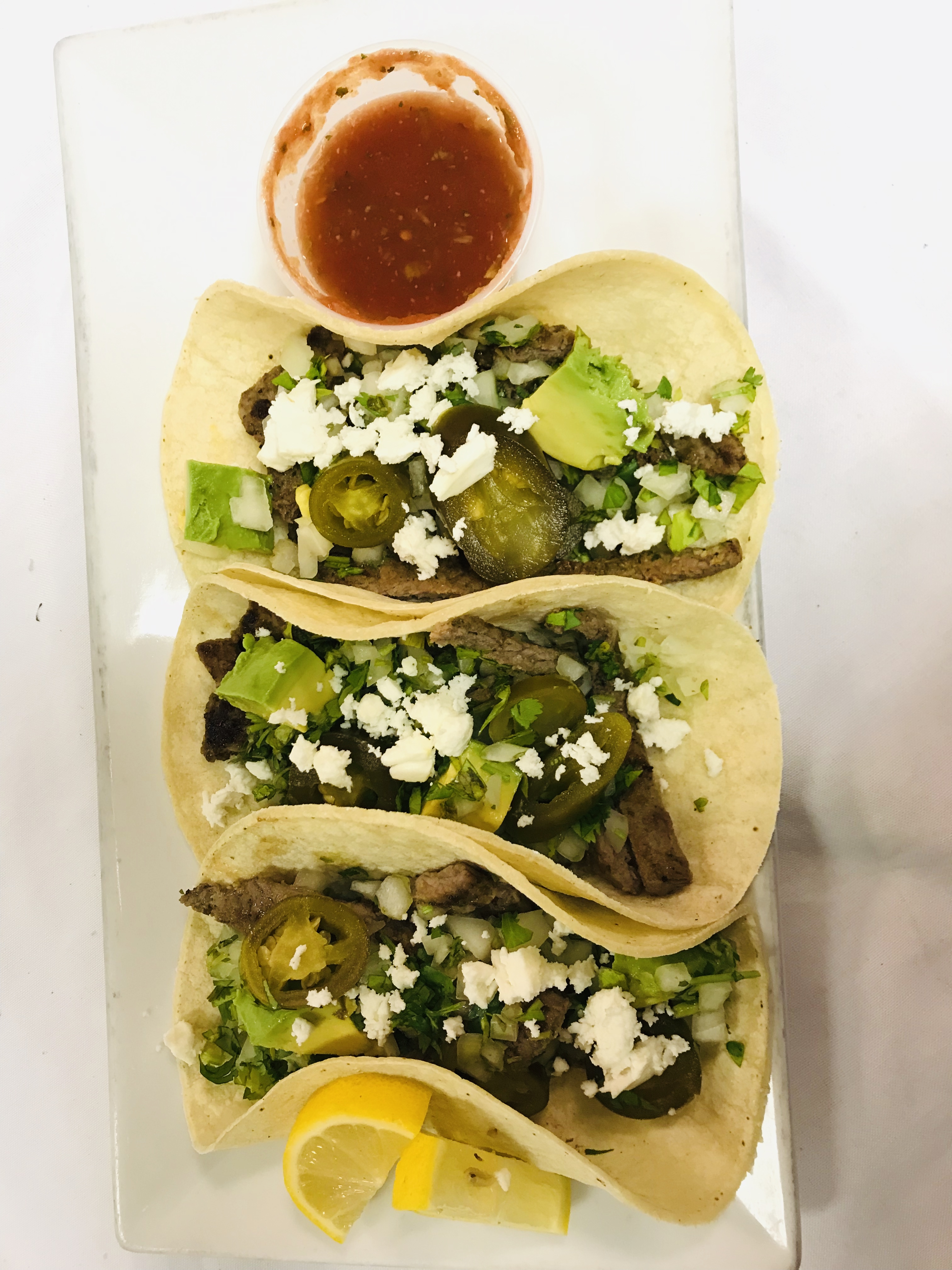 Order 3 cecina tacos food online from Papa Latin Cuisine store, West Haverstraw on bringmethat.com