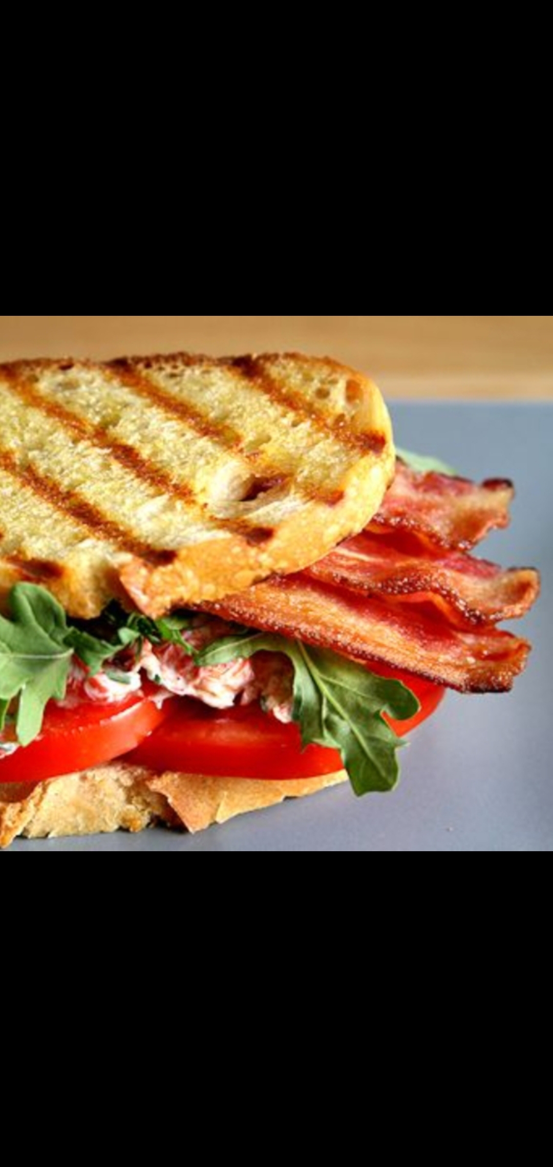 Order  Bacon Lettuce & Tomatoes Panini  food online from American Gourmet Foods Deli store, New York on bringmethat.com