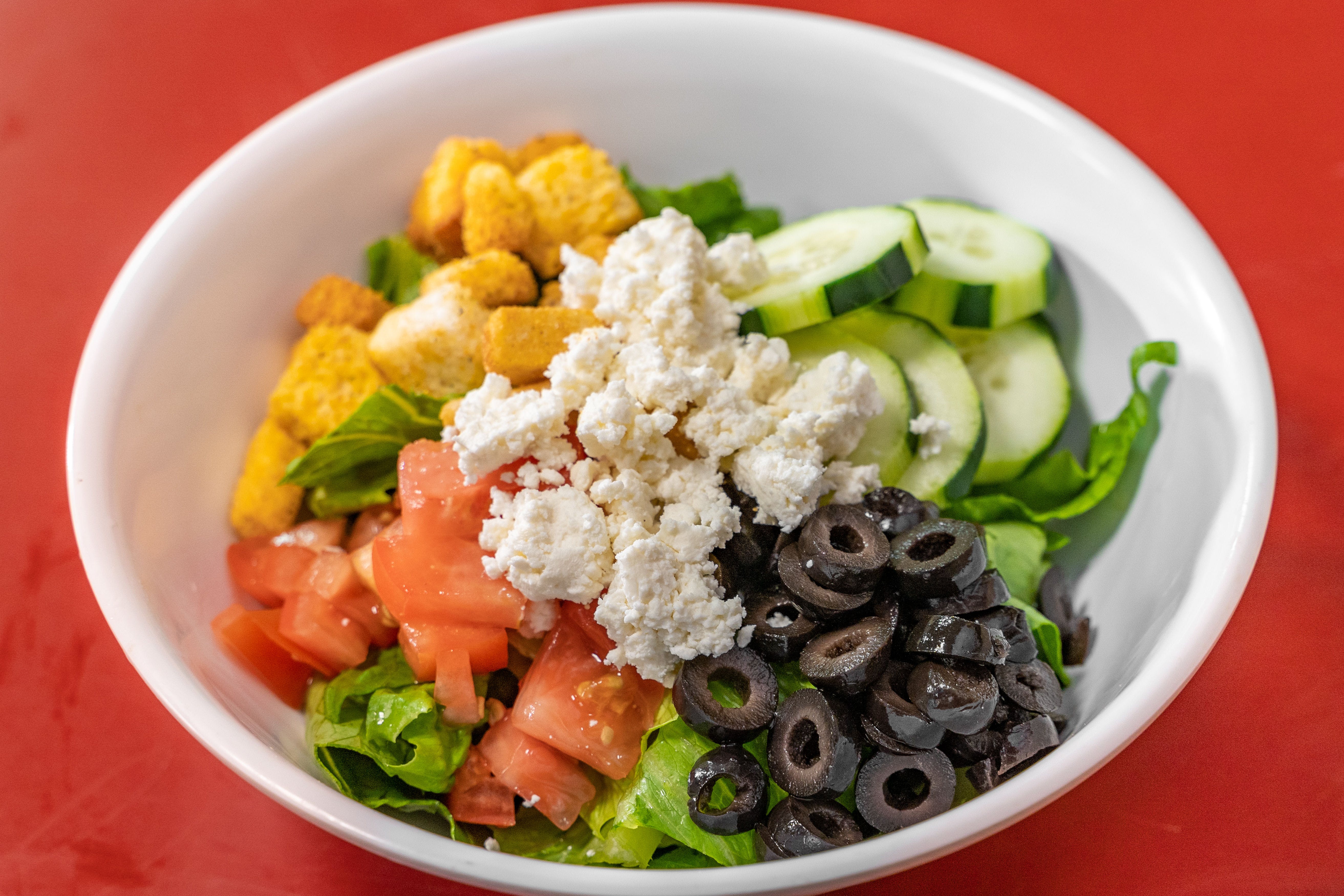 Order Greek Salad - Salad food online from Buffalo's Pizza store, Sacramento on bringmethat.com