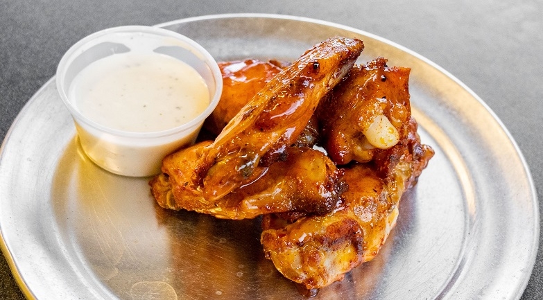 Order 5 Wings 3PO food online from Holy Pie Pizzeria store, Garden City on bringmethat.com