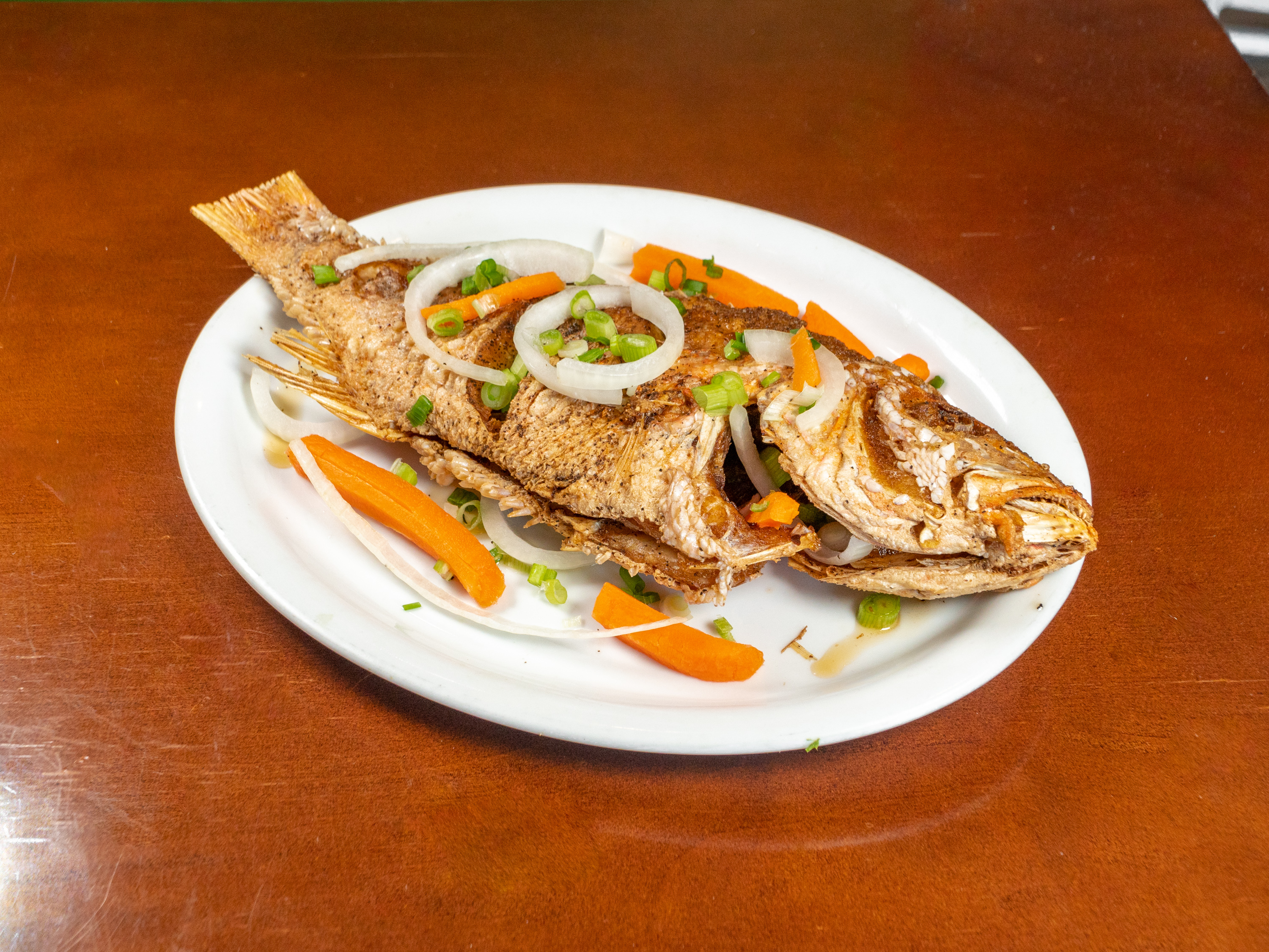 Order Fried Snapper food online from Caribbean Plate store, Falls Church on bringmethat.com