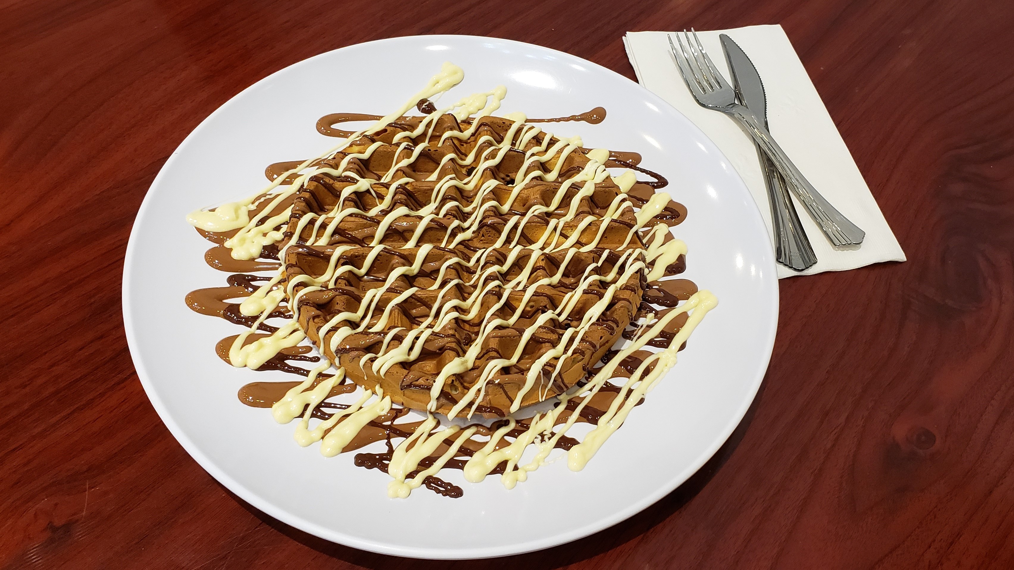 Order Triple Chocolate Waffle food online from Sleek Creperie Cafe store, Cypress on bringmethat.com