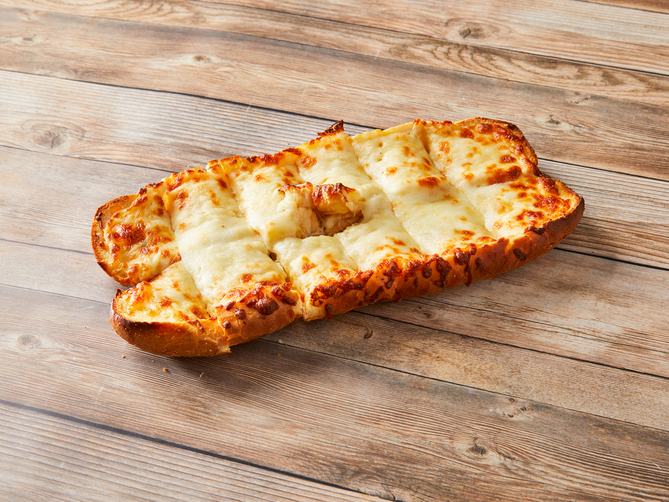 Order Garlic Bread with Cheese food online from Bruno's Pizza - S. Michigan St. store, South Bend on bringmethat.com