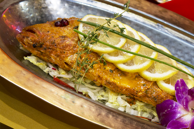 Order Tandoori Genghis Queen(roasted red snapper) food online from Bombay Chowk store, New York on bringmethat.com