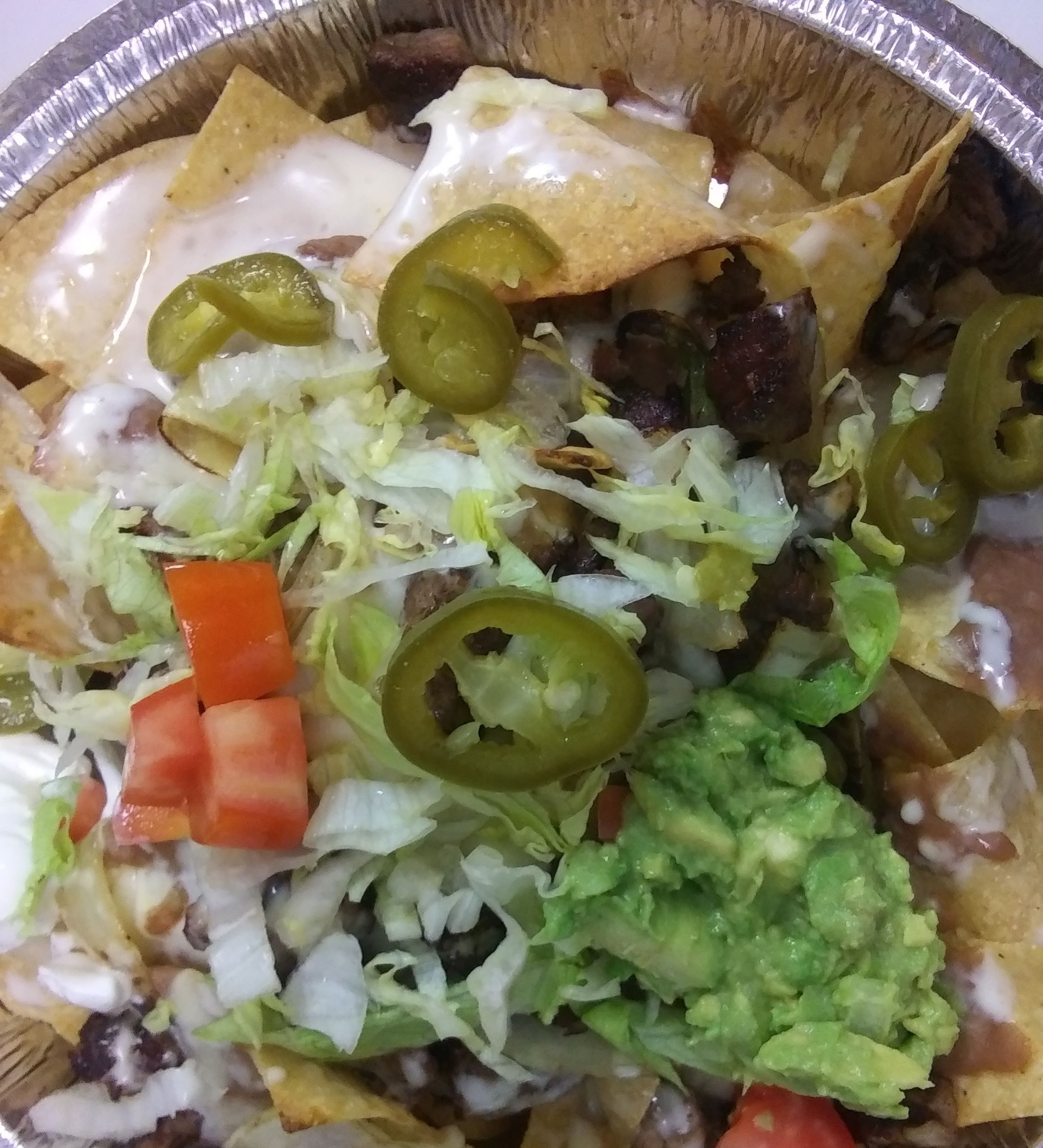 Order Nachos Fajitas food online from Jalapeno Mexican Restaurant store, Lawrenceville on bringmethat.com