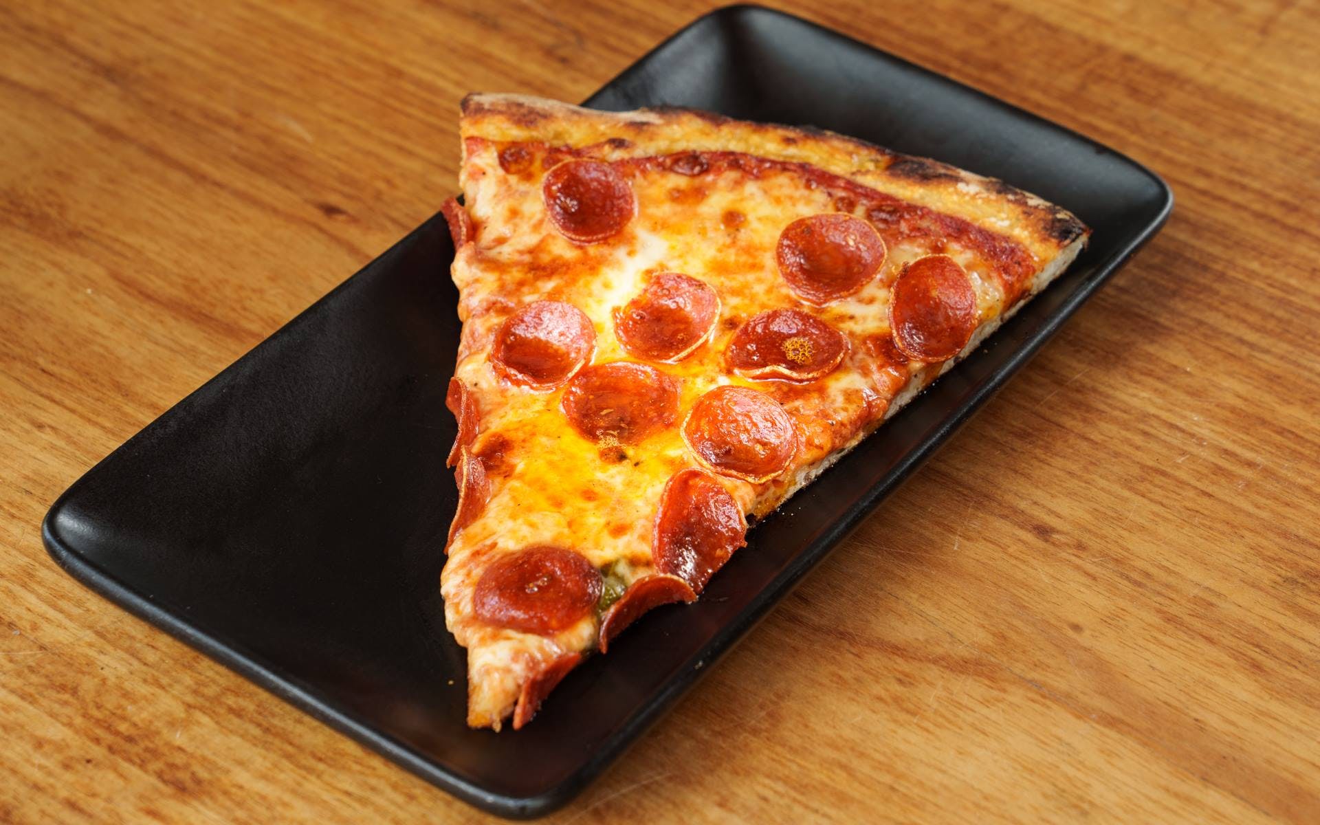 Order Round Pepperoni - Slice food online from Sunset Squares Slice Shop store, San Francisco on bringmethat.com