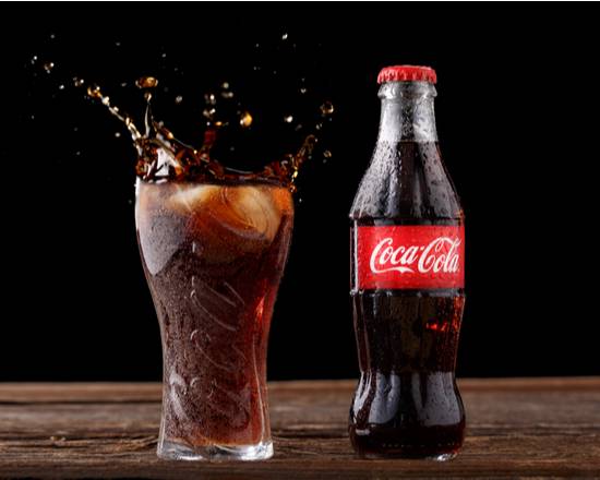 Order Coke (20 oz) food online from Exquisite Bowls store, Jeannette on bringmethat.com